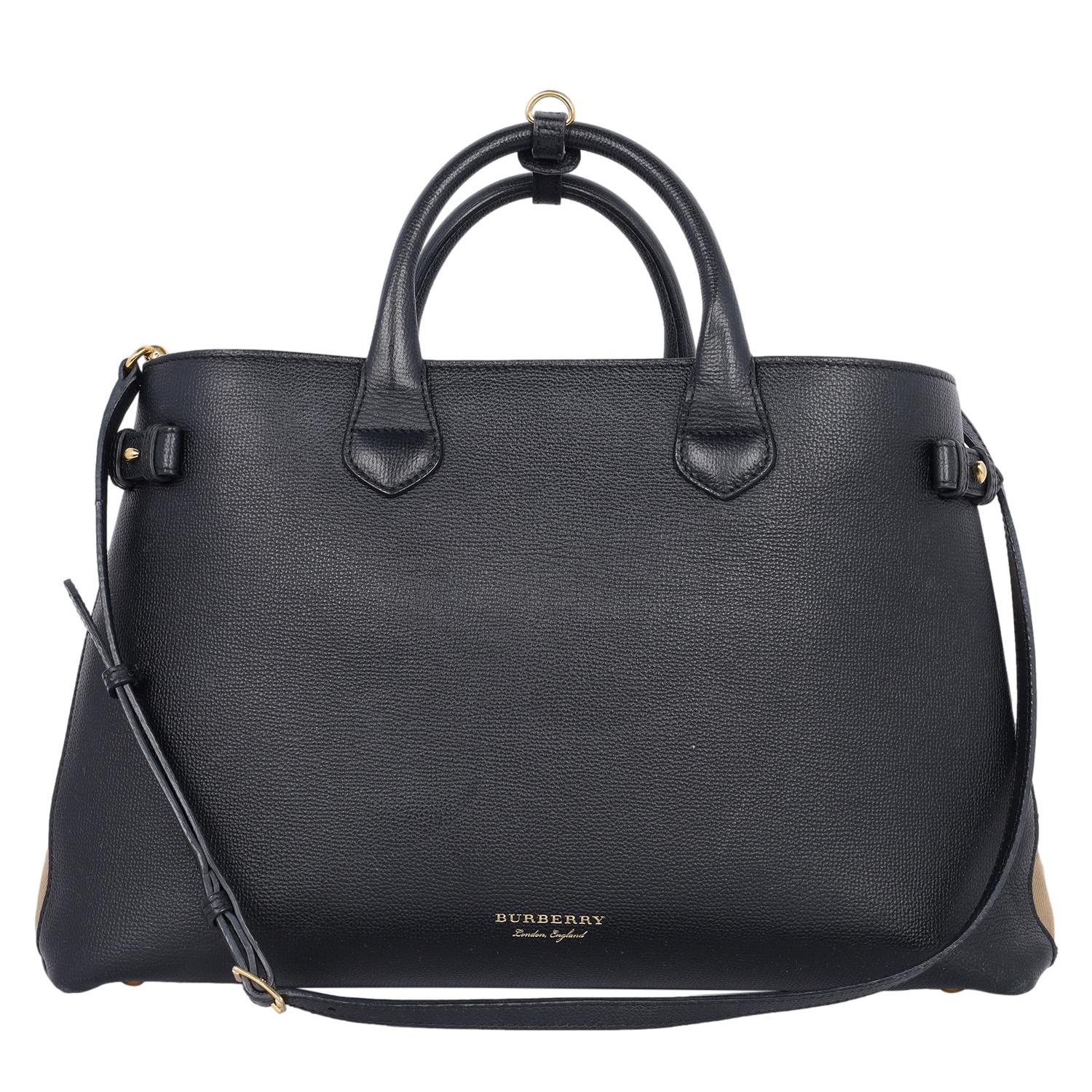 Authentic, pre-owned Burberry large Banner House Check Leather Shoulder Bag Tote. Features grained calfskin leather in black, rolled leather top handles with side belts, removable and adjustable black leather shoulder strap, snap closures on both