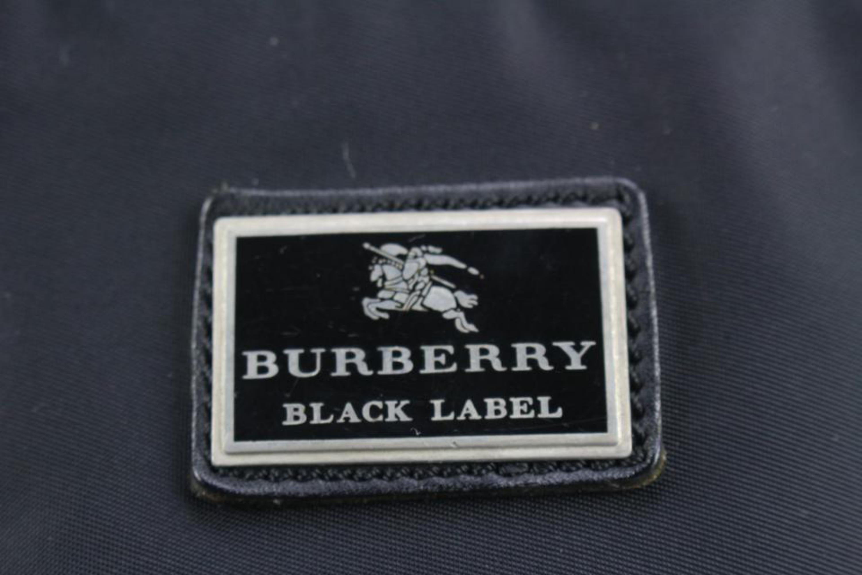 Burberry: Nova-Tragetasche, großer schwarzer Nova-Karo, 69b23 (Schwarz) im Angebot