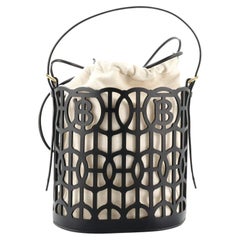 Burberry Laser Cut Drawstring Bucket Bag Leather with Canvas
