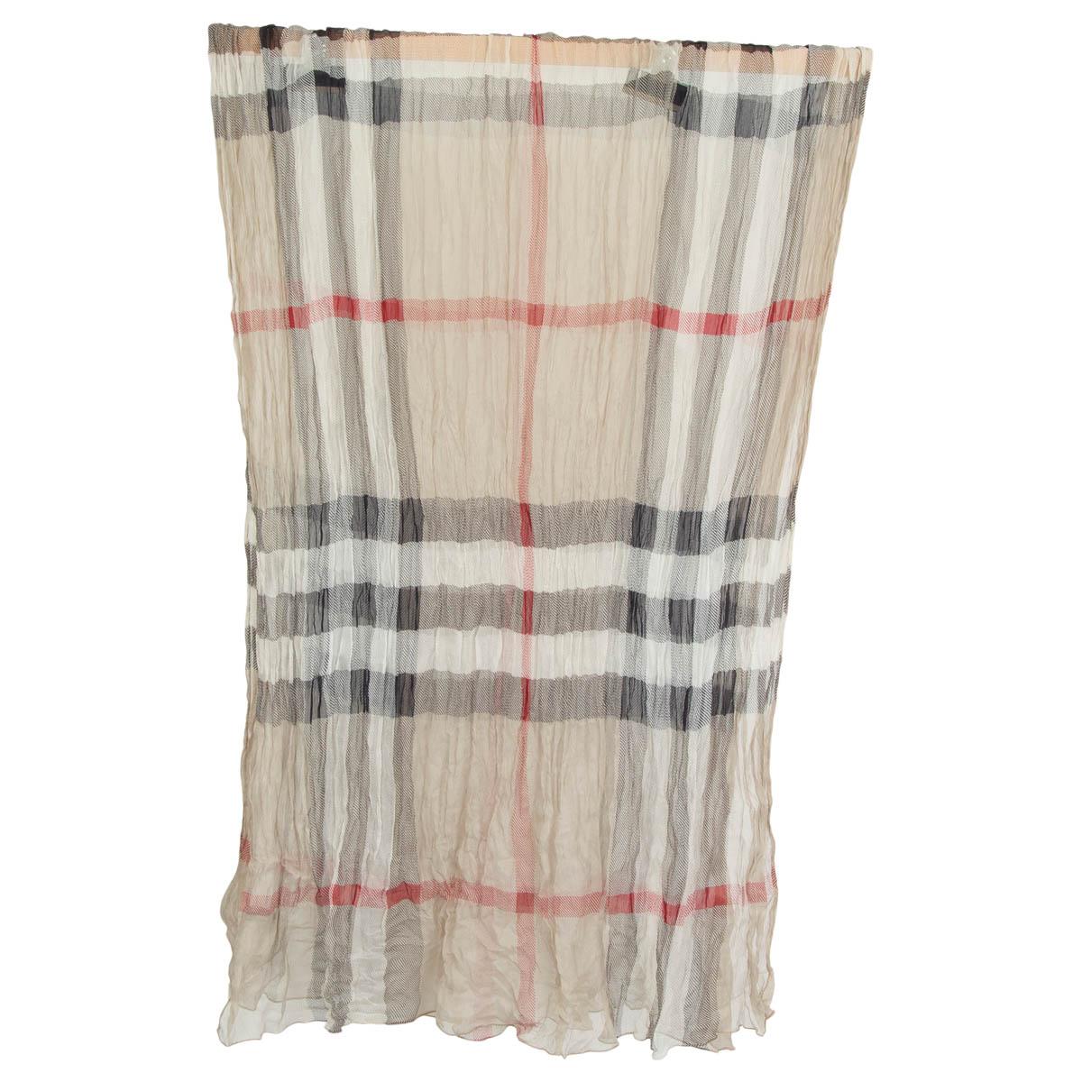 100% authentic Burberry lightweight crinkle scarf in light gray silk (assumed cause tag is missing). Has the classic Burberry check print. Has been worn and is in excellent condition.

Measurements
Width	60cm (23.4in)
Height	200cm (78in)

All our