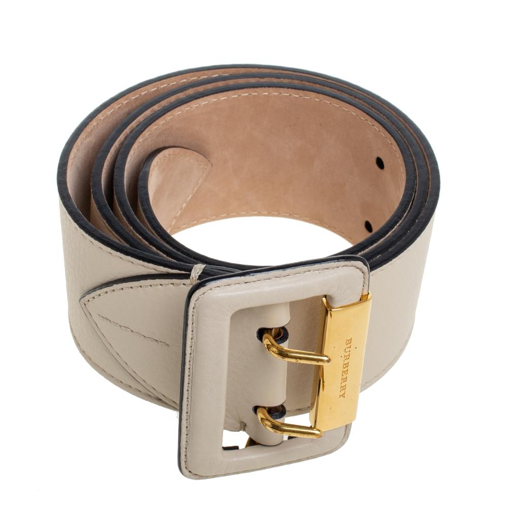 Accessorize right with this lovely waist belt from Burberry. It is beautifully made from leather and detailed with a double pin buckle. The beige Cecile belt can be worn to cinch skirts and dresses.

Includes:Original Dustbag
