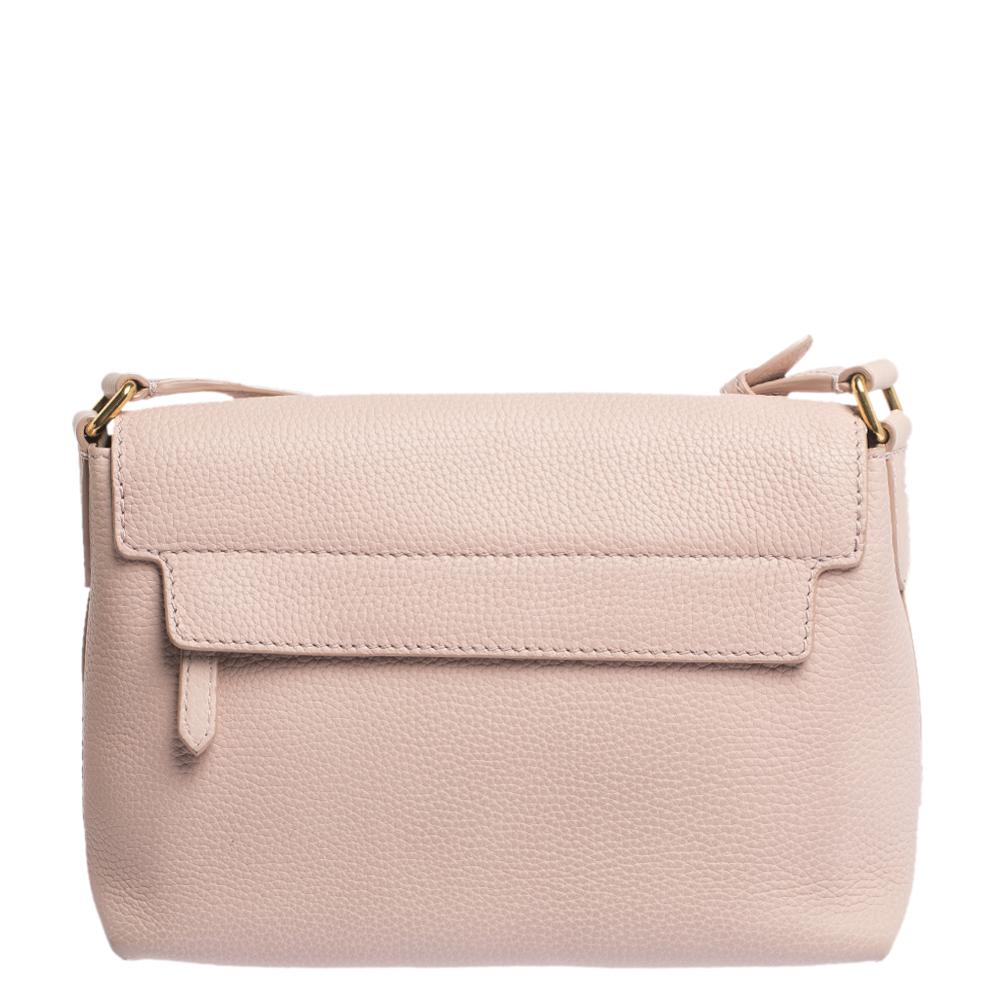 This bag from Burberry will surely assist you on all days. Crafted meticulously from quality leather and lined with suede, this is a splendid pick. This luxe accessory has a lovely light pink hue and is equipped with a spacious interior and an