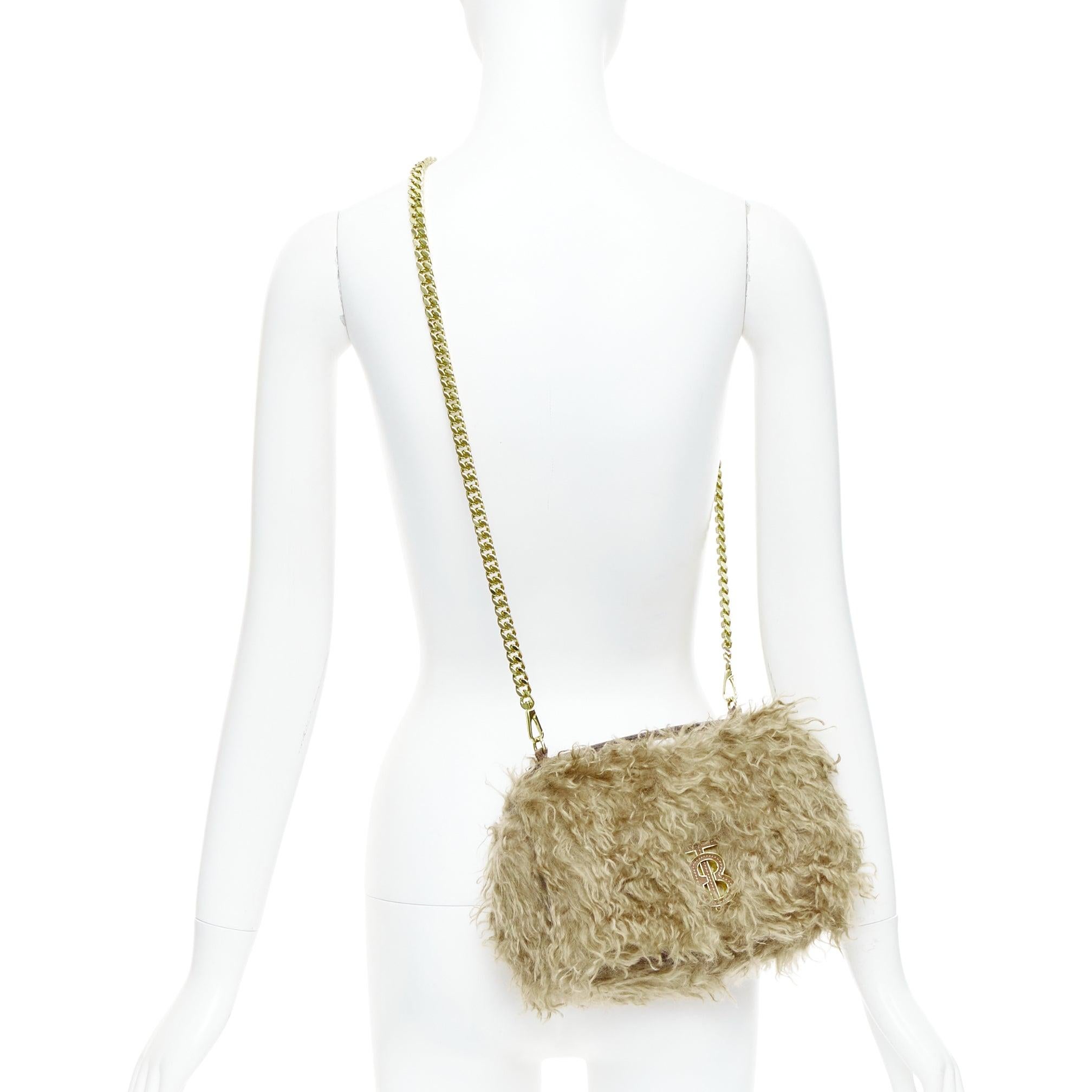 BURBERRY Lola Mohair Limited Edition lamb shearling gold TB crossbody bag
Reference: TGAS/E00475
Brand: Burberry
Model: Lola Mohair
Collection: Runway
Material: Fur, Leather
Color: Brown, Gold
Pattern: Solid
Closure: Clasp
Lining: Cream Fabric
Extra