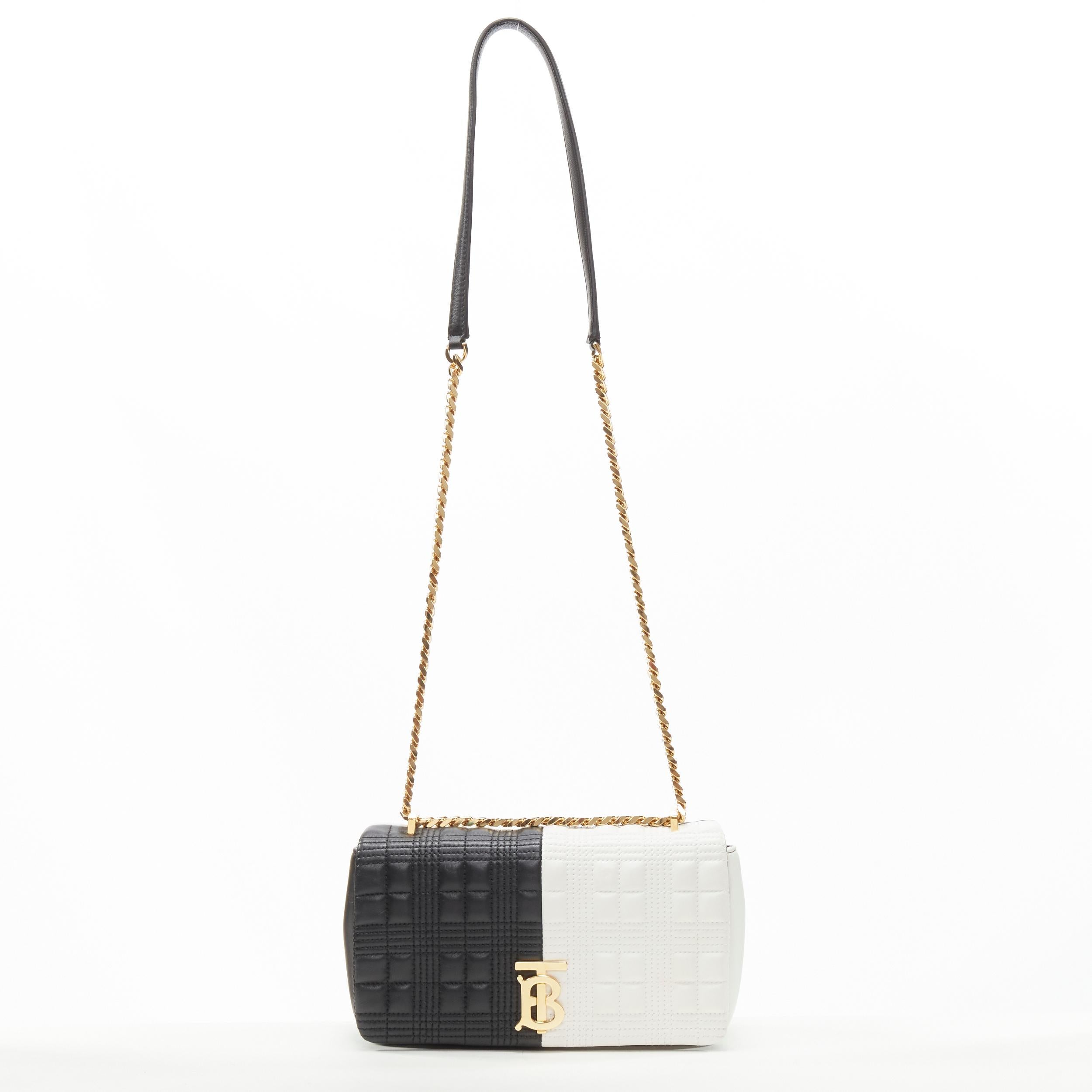 BURBERRY Lola TB gold bi-color black white quilted leather flap bag 
Reference: KEDG/A00113 
Brand: Burberry 
Designer: Riccardo Tisci 
Model: Lola 
Material: Leather 
Color: Black 
Pattern: Solid 
Closure: Magnet 
Extra Detail: Lola collection.
