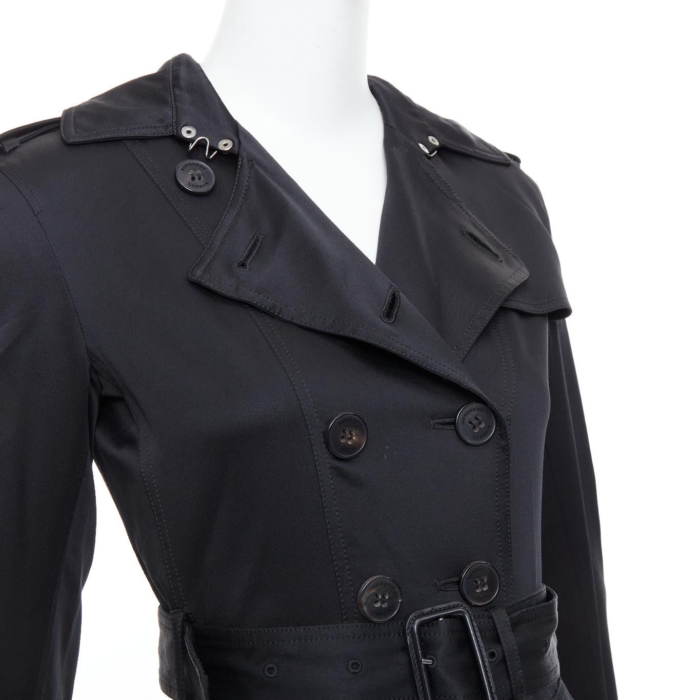 BURBERRY LONDON black 100% silk check lined belted trench coat
Reference: JACG/A00262
Brand: Burberry
Material: Silk
Color: Black
Pattern: Solid
Closure: Belt
Lining: Multicolour Fabric
Extra Details: House check lined.
Made in: