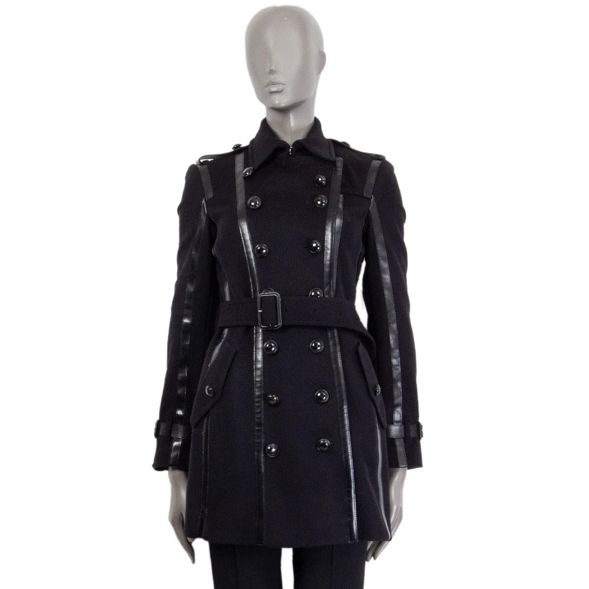 100% authentic Burberry London double breasted wool coat in black virgin wool (80%), cashmere (20%) and black cow leather (100%) details. Closes with one hook at the neck, six buttons on the front and a belt, featuring leather belted cuffs, epaulets