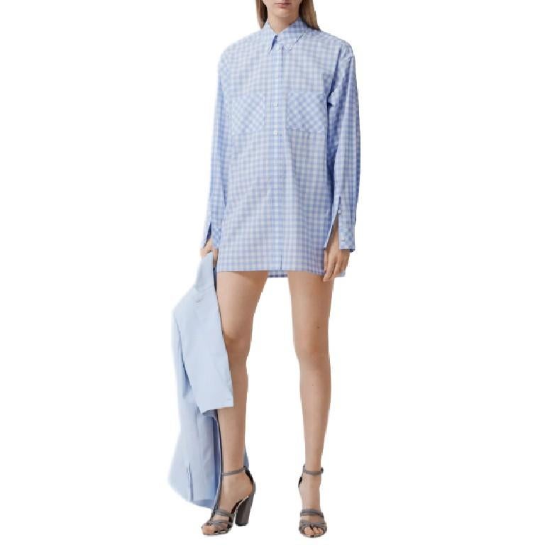 Burberry London Blue Gingham Cotton Poplin Shirt Dress

- Mother of pearl buttons
- Long sleeves with buttoned cuffs
- Button closure
- Chest patch pockets

100% Cotton

Machine wash at 30 degrees

Made in Tunisia

Please note, these items are