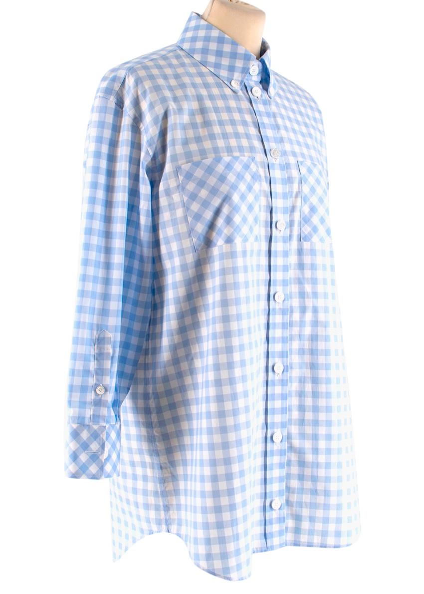 Burberry London Blue Gingham Cotton Poplin Shirt Dress

- Mother of pearl buttons
- Long sleeves with buttoned cuffs
- Button closure
- Chest patch pockets

100% Cotton

Machine wash at 30 degrees

Made in Tunisia

Please note, these items are