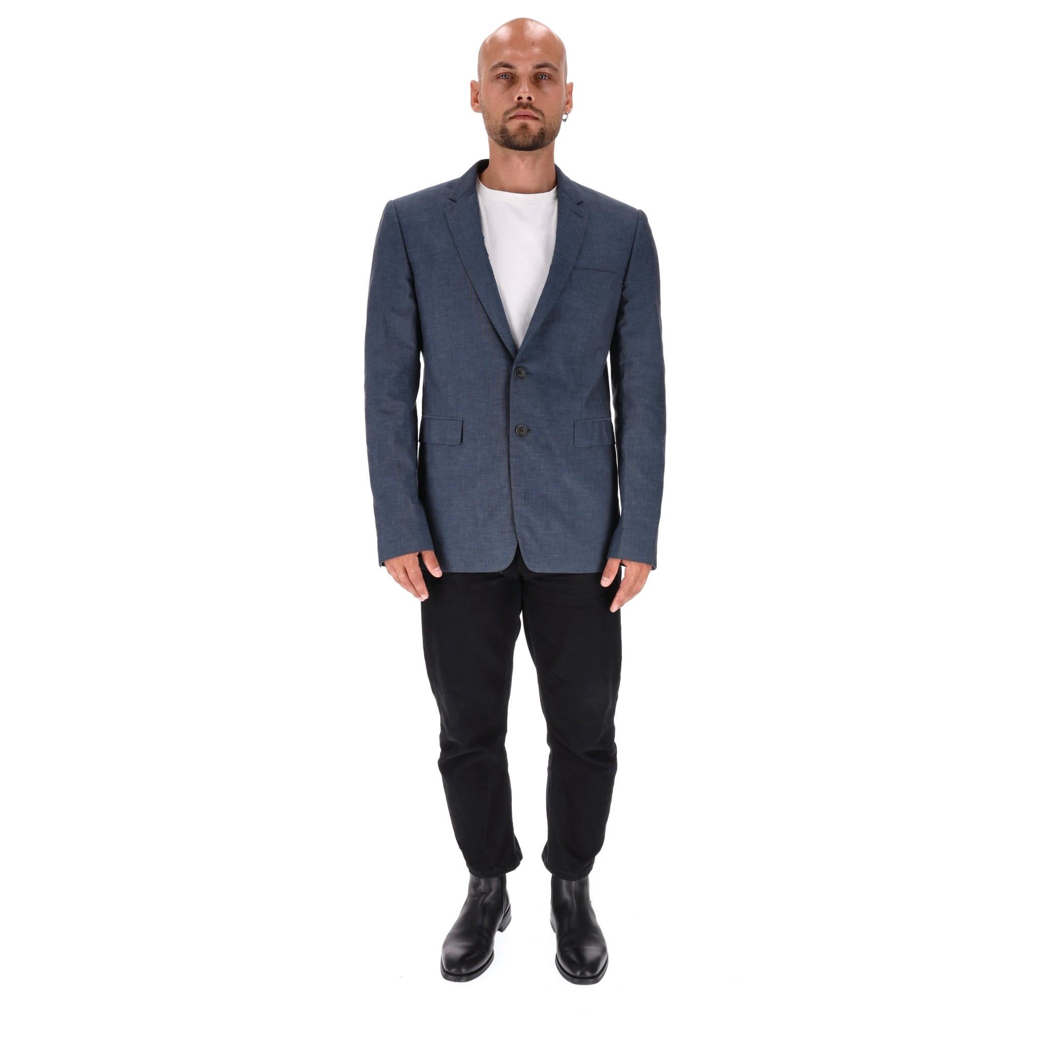 Burberry London Cotton & Silk Blend Suit Jacket

Navy, tailored jacket crafted of cotton and silk blend.

Featuring notched lapels, flap pockets to the sides and welt pocket to the chest.

Detailed with black 'Burberry' engraved buttons to the