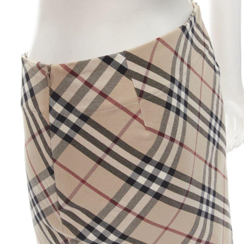 BURBERRY LONDON House Check brown signature mini skirt UK6 US4 S
Reference: ANWU/A01006
Brand: Burberry
Designer: Christopher Bailey
Material: Cotton
Color: Brown
Pattern: Checkered
Closure: Zip
Made in: England

CONDITION:
Condition: Very good,