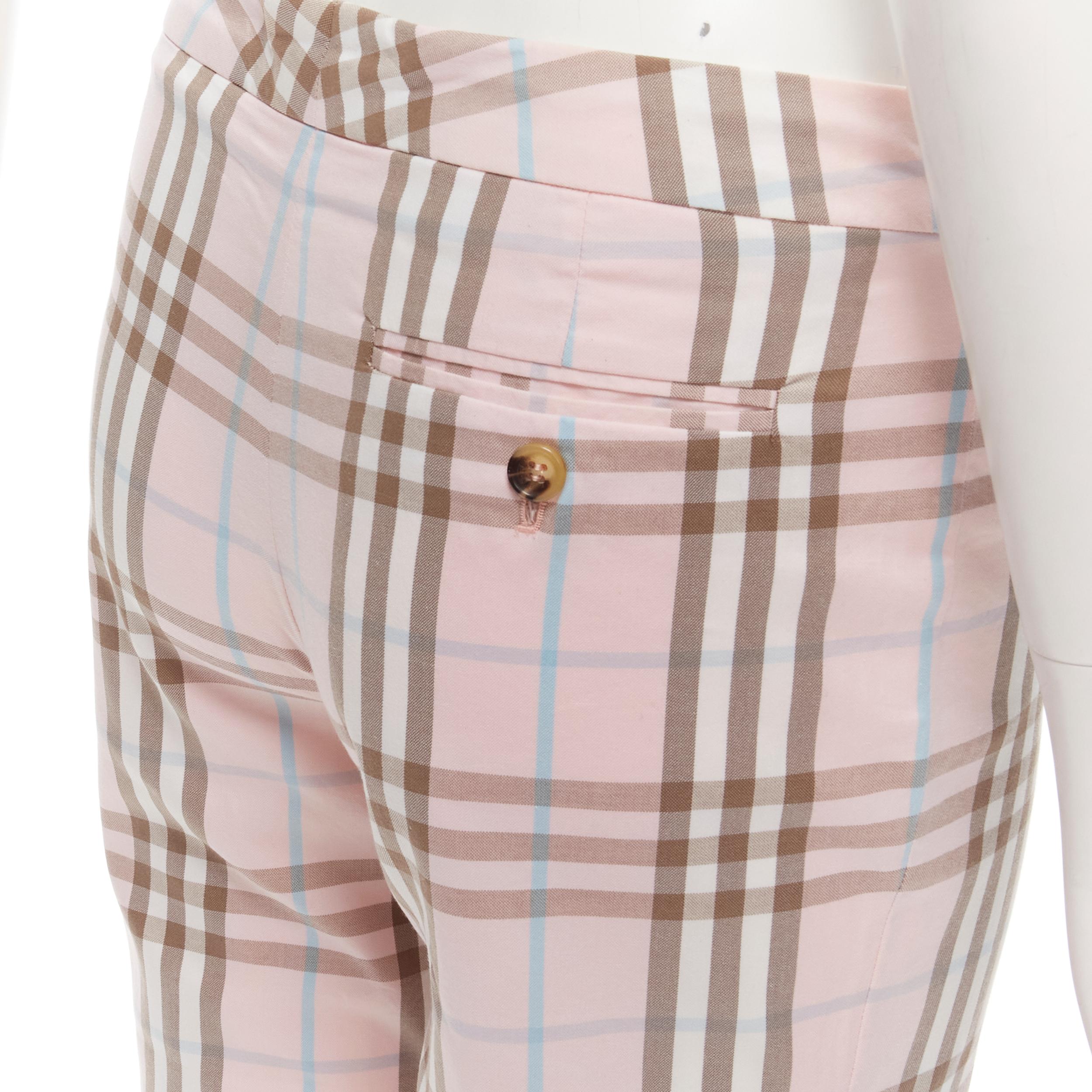 BURBERRY LONDON House Check pink cropped pants Y2K  UK6 US4
Brand: Burberry
Material: Feels like cotton
Color: Pink
Pattern: Checkered
Closure: Zip
Extra Detail: Button slit back pocket.

CONDITION:
Condition: Excellent, this item was pre-owned and