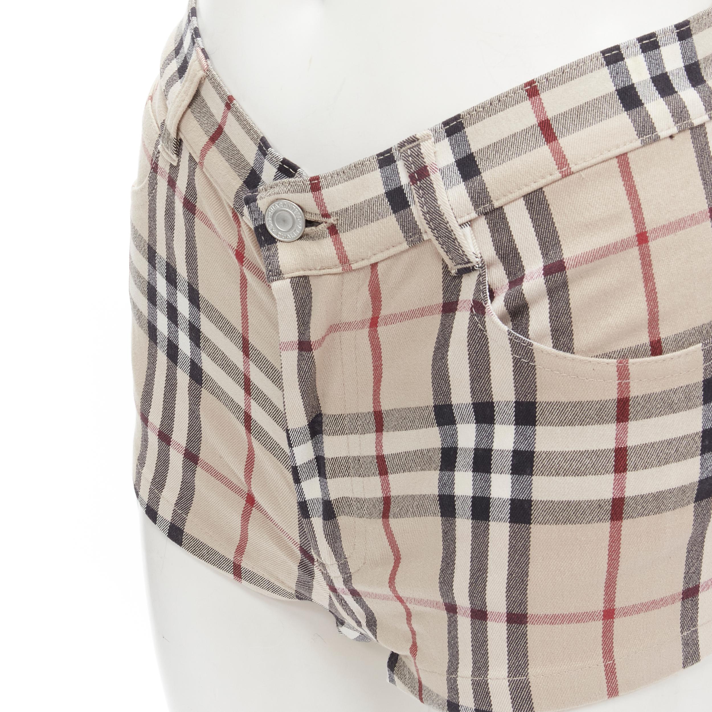 BURBERRY London House Check signature check beige mini shorts UK6 XS 
Reference: ANWU/A00536 
Brand: Burberry 
Collection: House Check 
Material: Cotton 
Color: Brown 
Pattern: Checked 
Closure: Zip fly 
Extra Detail: 5-pocket design. 
Made in: