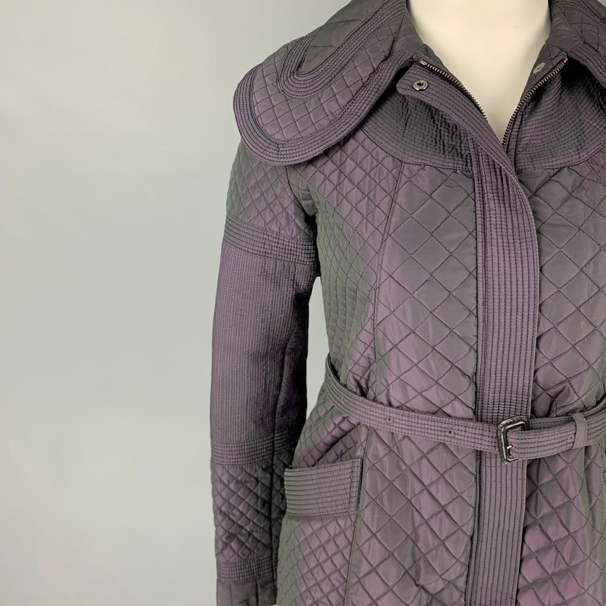 BURBERRY LONDON coat comes in a purple iridescent polyester featuring a quilted design, large collar, belted, patch pockets, and a zip & snap button closure.
Very Good
Pre-Owned Condition. 

Marked:   UK 14 / USA 12 / IT 46 / GER 42 / FRA 44