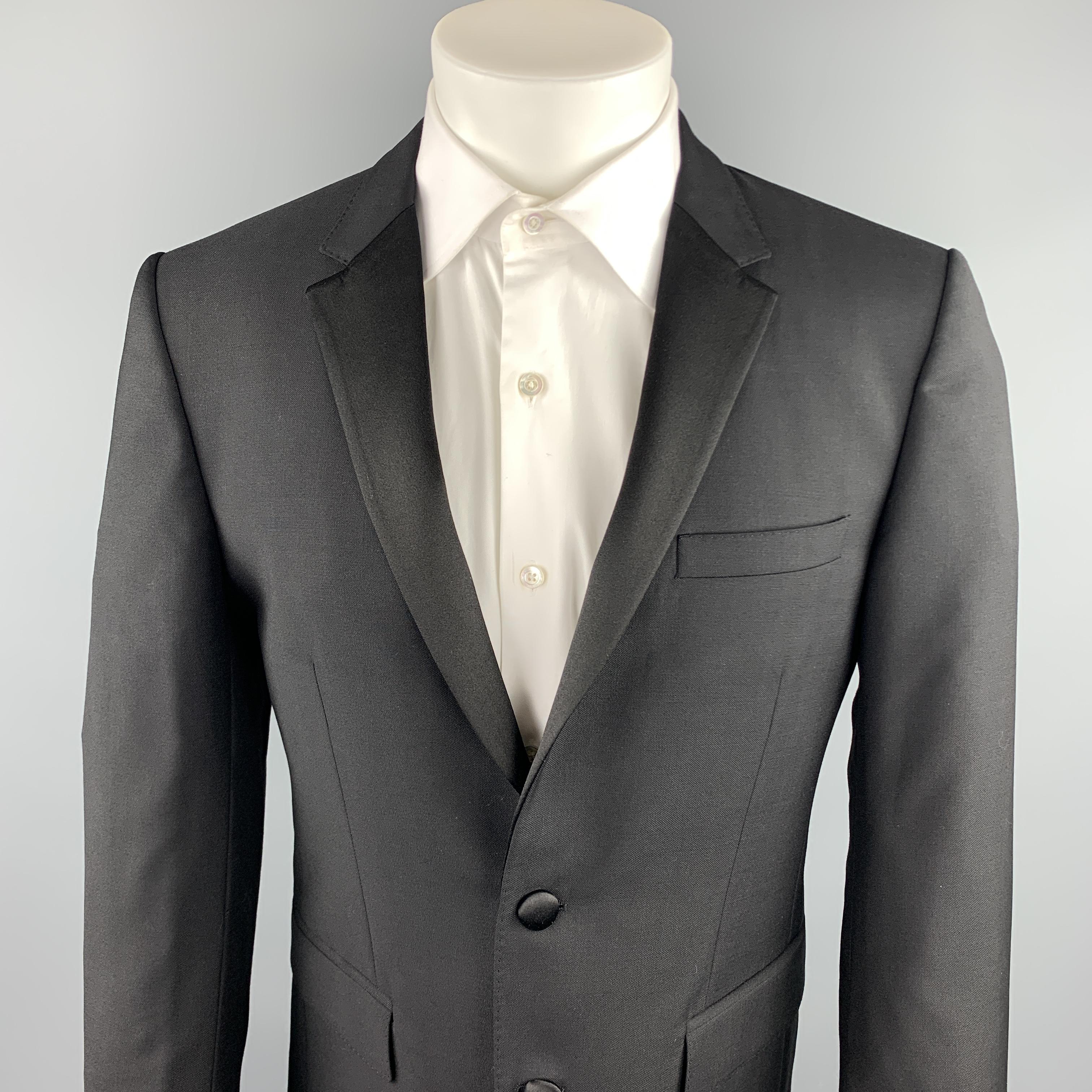 BURBERRY LONDON tuxedo sport coat comes in a black wool / mohair featuring a notch lapel style, flap pockets, and a two button closure. Made in Italy.

Excellent Pre-Owned Condition.
Marked: IT 48

Measurements:

Shoulder: 17.5 in. 
Chest: 38 in.