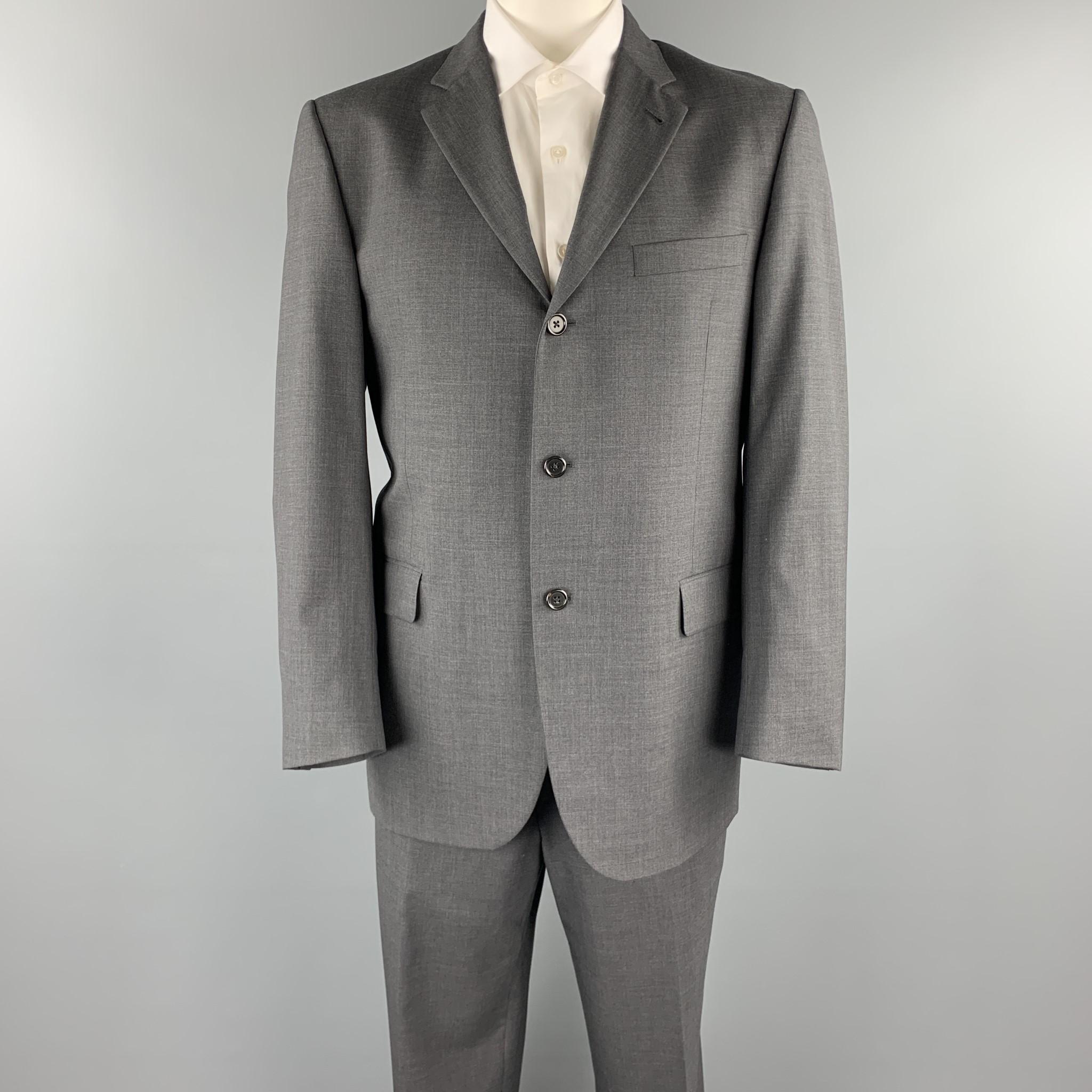 BURBERRY LONDON suit comes in a dark gray wool and includes a single breasted, three button sport coat with a notch lapel and matching flat front trousers. Made in USA.

Excellent Pre-Owned Condition.
Marked: 42 R

Measurements:

-Jacket
Shoulder: