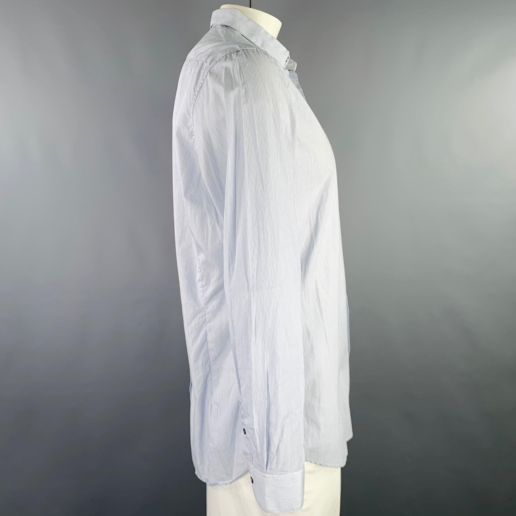 BURBERRY LONDON long sleeve shirt
in a white and light blue cotton woven fabric featuring a stripe pattern, tailored fit,, and button closure. Excellent Pre-Owned Condition. 

Marked:   16.5 - 42R 

Measurements: 
 
Shoulder: 17.5 inches Chest: 44