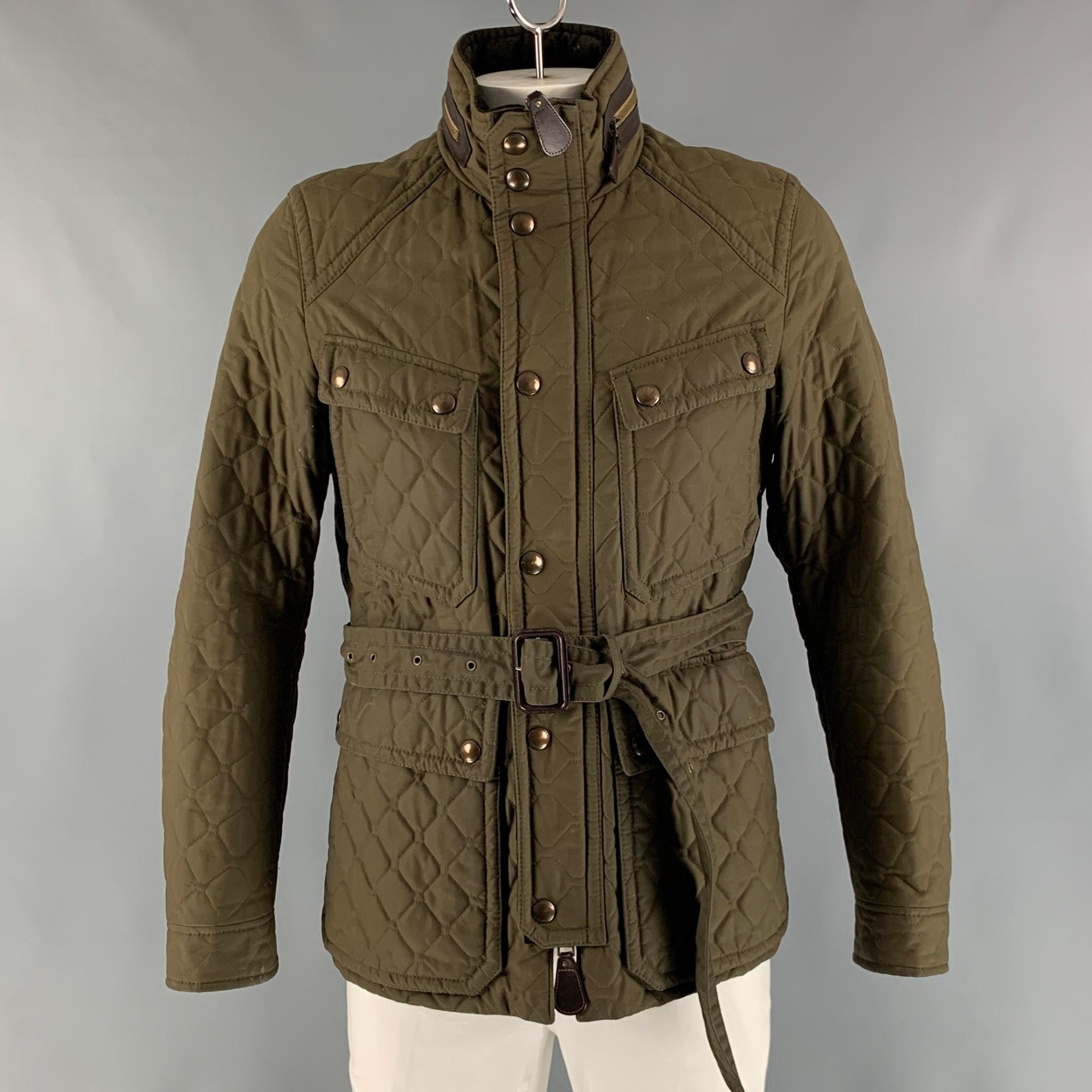 BURBERRY LONDON coat comes in an olive nylon blend woven material featuring a quilted design, high collar, belted, built-in hood, patch pockets, and a zip & snap button closure.

Excellent Pre-Owned Condition.
Marked: 54

Measurements:

Shoulder: 18