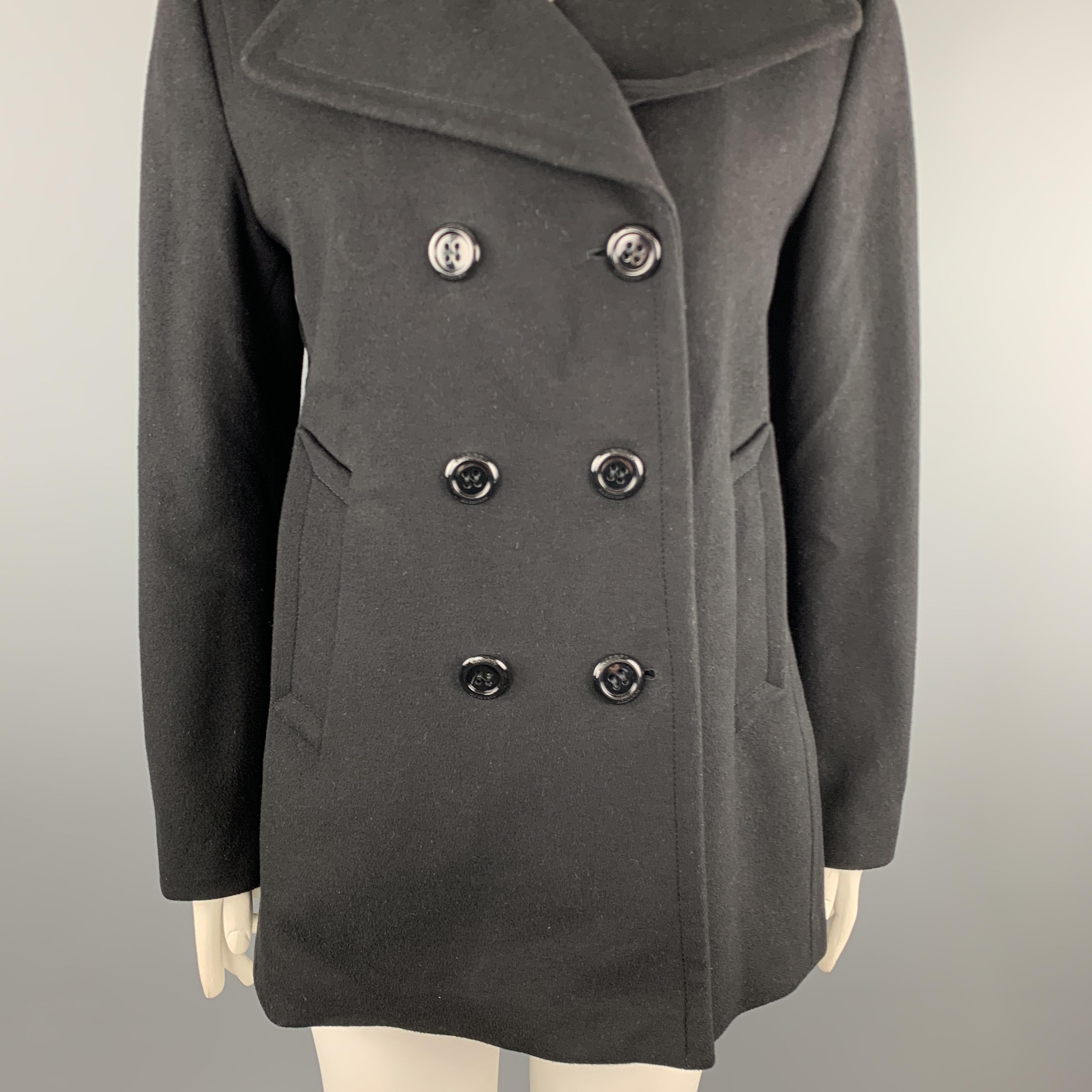 BURBERRY LONDON classic peacoat comes in black cashmere wool blend fabric with a double breasted button front and slit pockets. 

Excellent Pre-Owned Condition.
Marked: L

Measurements:

Shoulder: 18 in.
Bust: 46 in.
Sleeve:24 in.
Length: 29 in.