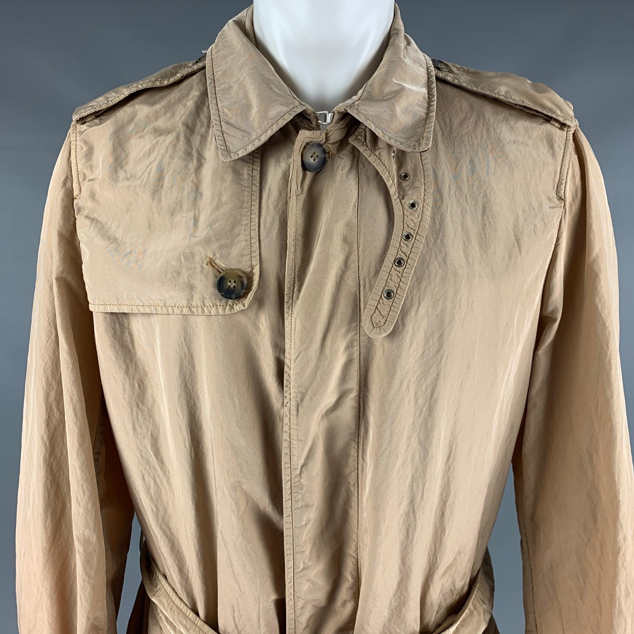 BURBERRY LONDON trenchcoat
in a beige nylon fabric featuring a belted style, and hidden button closure. Made in Italy.Very Good Pre-Owned Condition. Minor signs of wear. 

Marked:   M 

Measurements: 
 
Shoulder: 18 inches Chest: 44 inches Sleeve: