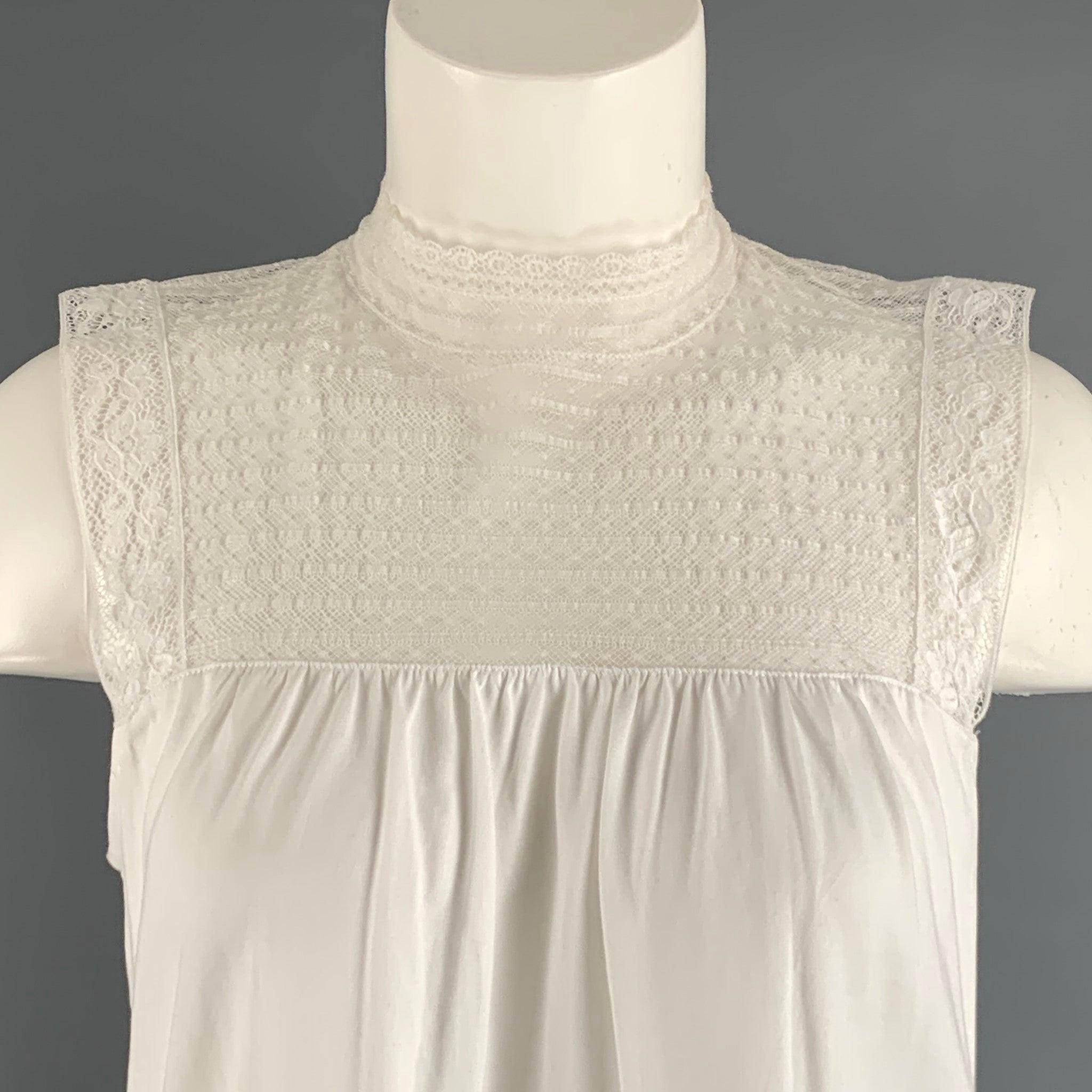 BURBERRY LONDON casual top comes in a white cotton jersey material featuring a lace panel.Good Pre-Owned Condition. Moderate Marks. 

Marked:   M 

Measurements: 
 
Shoulder: 14 inches Chest: 38 inches Length: 23.5 inches 
  
  
 
Reference: