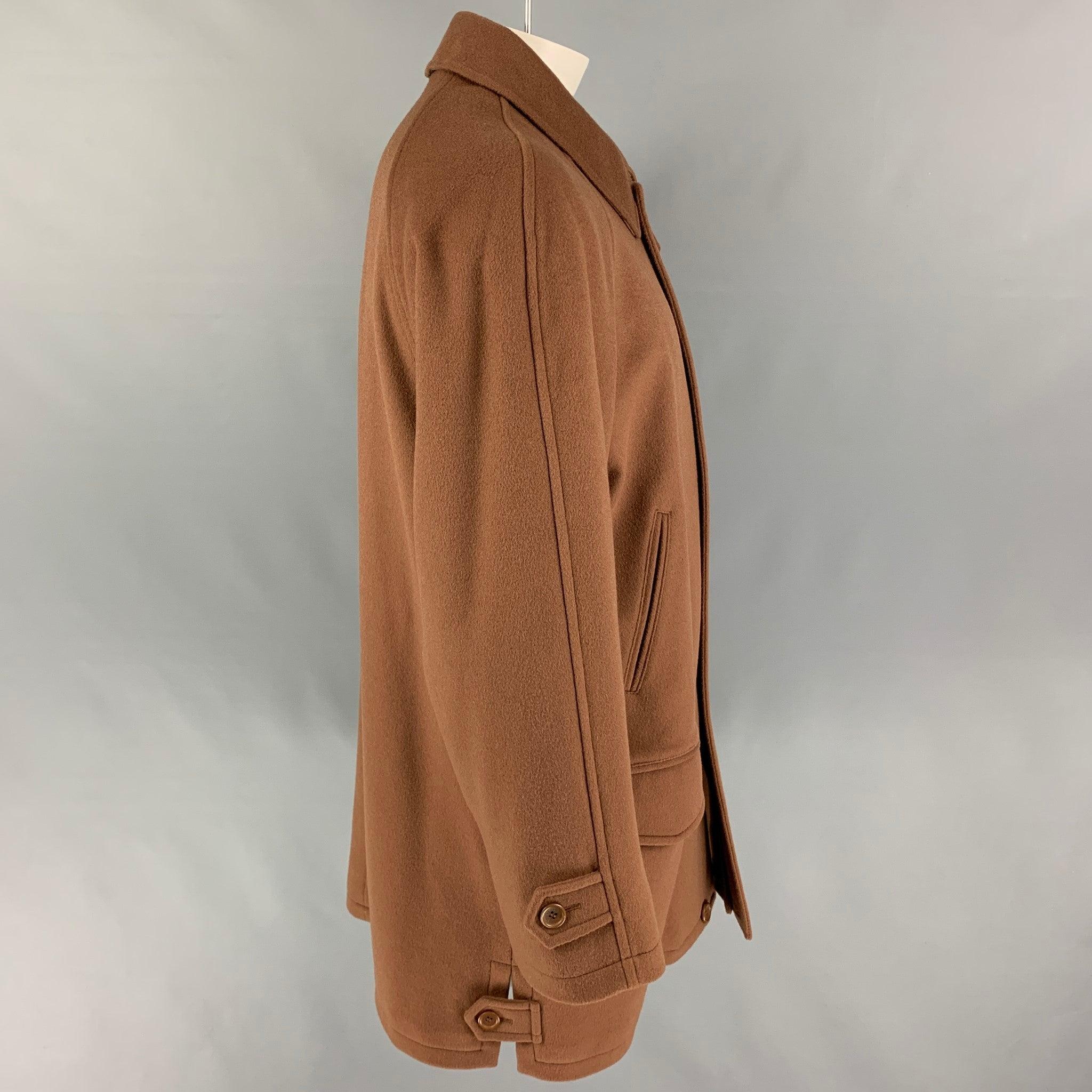 BURBERRY LONDON coat comes in a brown material with a quilted interior featuring a spread collar, front pockets, side tabs, and a zip & buttoned closure. Made in Italy. Very Good
Pre-Owned Condition. Fabric tag removed. 

Marked:  Size tag removed