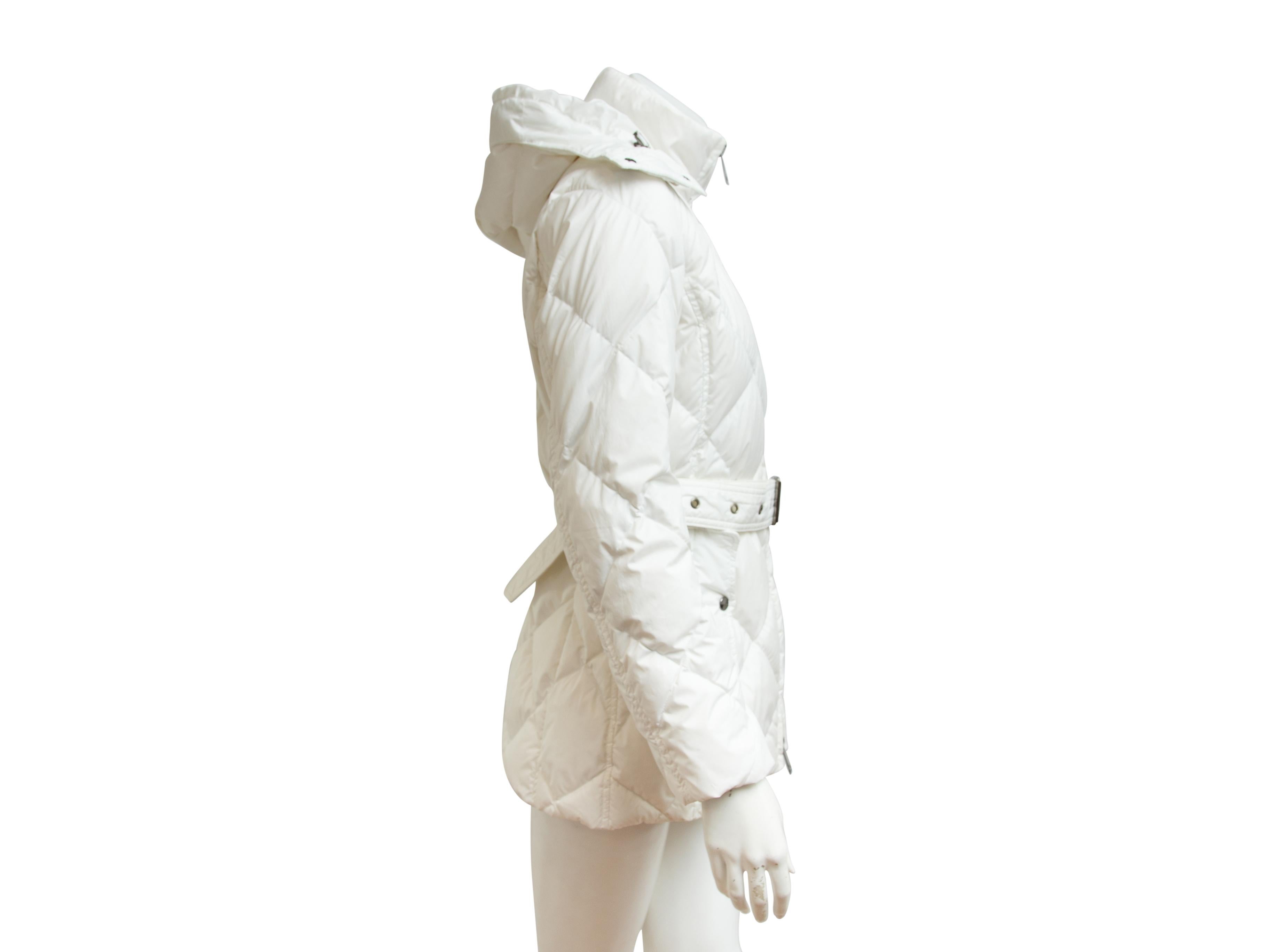 Product details:  White quilted puffer coat by Burberry London.  Detachable hood with adjustable 4drawstring.  Long sleeves.  Zip-front closure.  Adjustable belted waist.  Antiqued silvertone hardware.  28