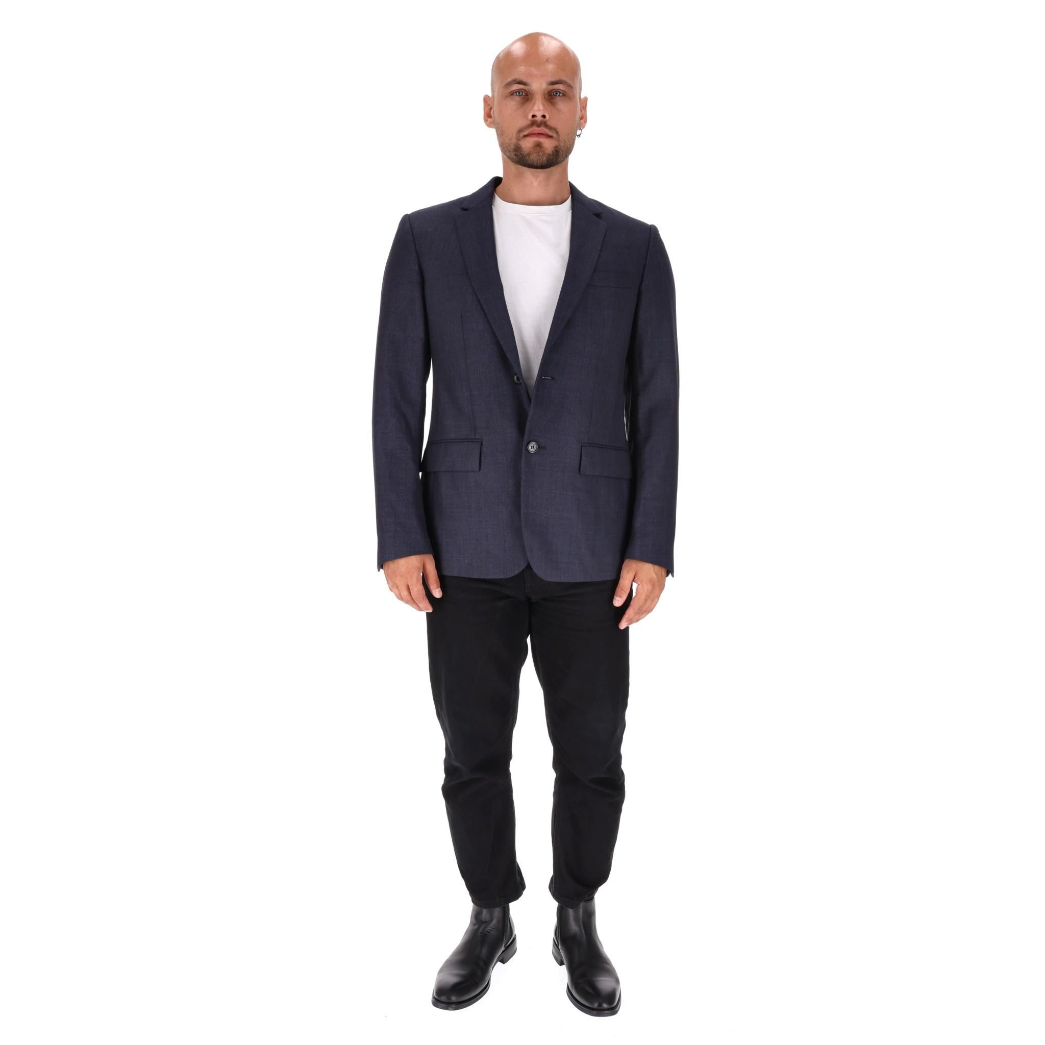 Burberry London Wool Suit Jacket

Navy, tailored jacket fully crafted from wool and designed in tonal plaid check pattern.

Featuring notched lapels, flap pockets to the sides and welt pocket to the chest.

Detailed with black 'Burberry' engraved