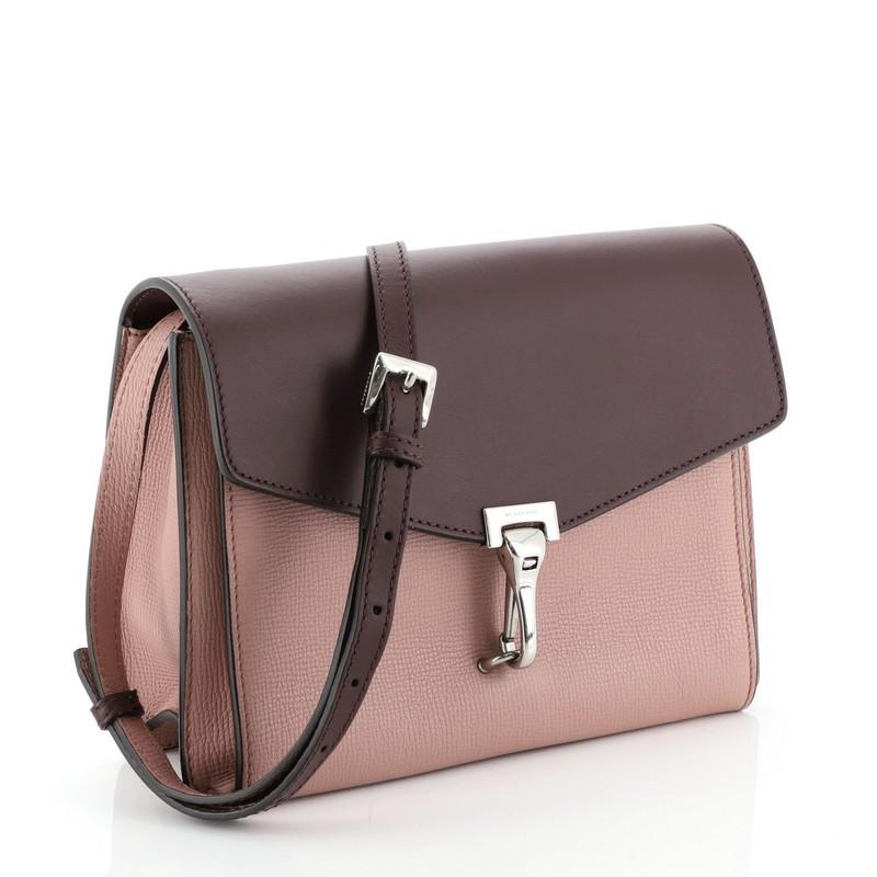 This Burberry Macken Crossbody Bag Leather Small, crafted from pink and purple leather, features adjustable leather shoulder strap, exterior back zip pocket, and silver-tone hardware. Its hinged-clasp flap closure opens to a printed fabric interior