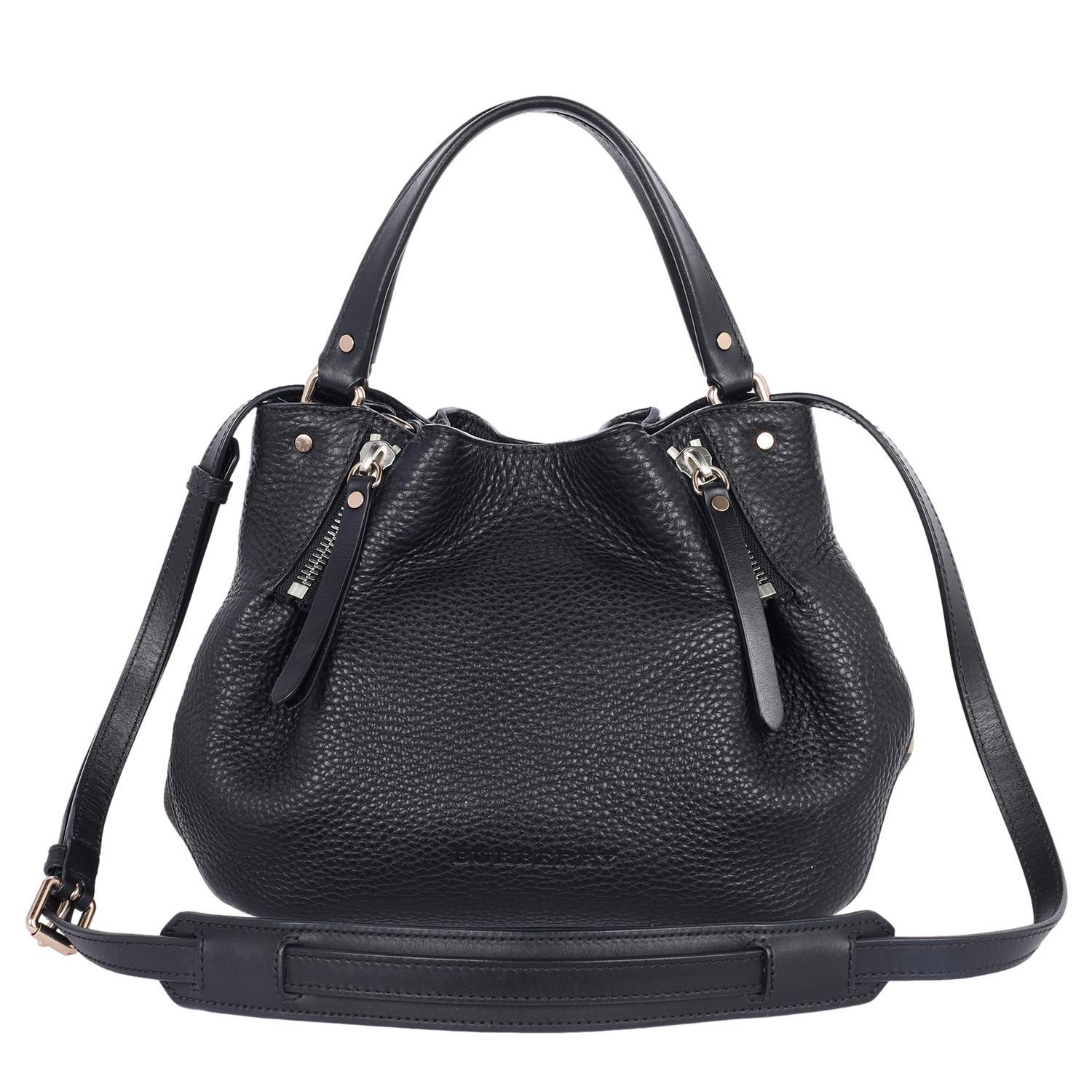 Authentic, pre-owned Burberry Maidstone Grained Leather Crossbody Bag. Features black grained calfskin leather and Burberry house check fabric sides, flat leather handles, adjustable shoulder strap with polished gold hardware, side snap closures,