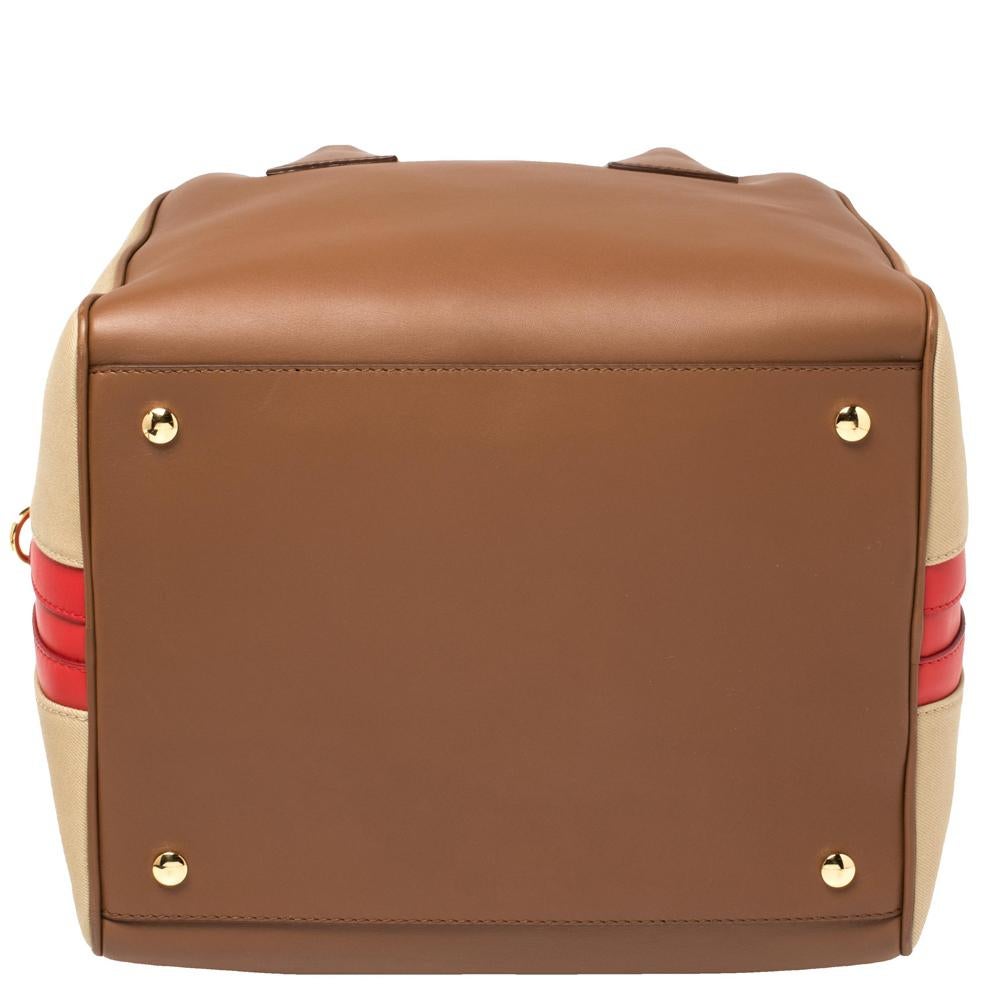 brown leather bowling bag