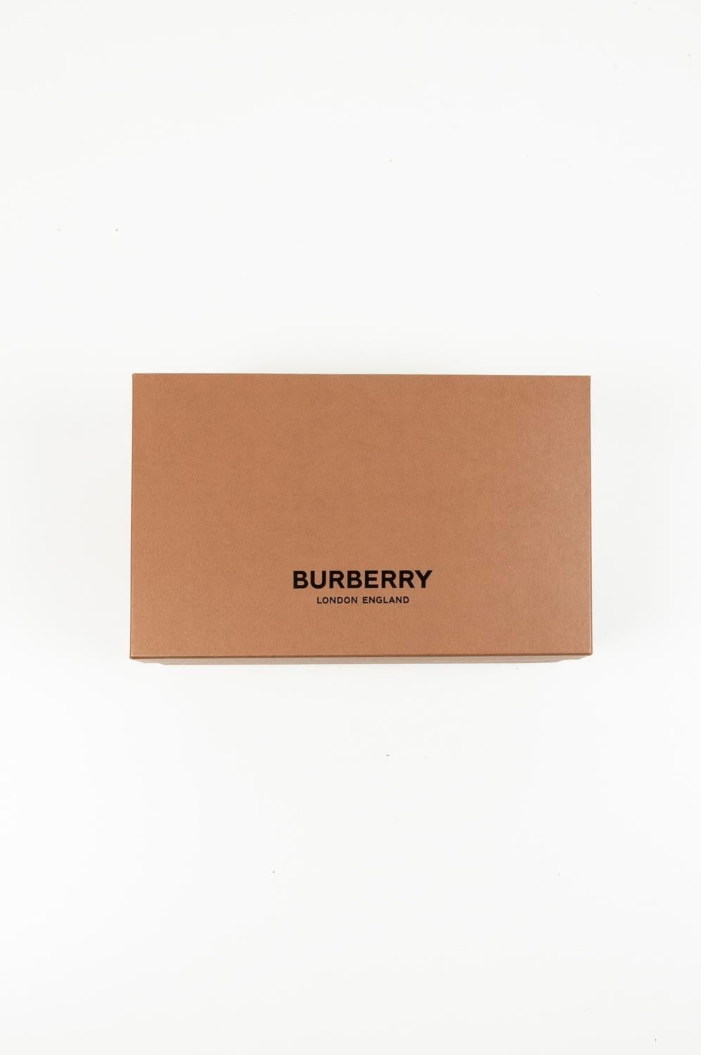 Item for sale is 100% genuine Burberry Men Sliders, S327
Color: Blue/Black
(An actual color may a bit vary due to individual computer screen interpretation)
Material: Rubber/Cloth
Tag size: 45EUR, USA11, UK 10 1/2
These shoes are great quality item.