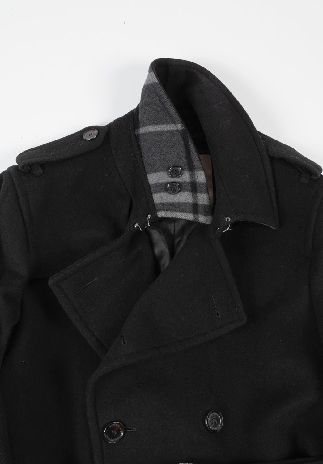 100% genuine Burberry overcoat, S826, ASH1
Color: black
(An actual color may a bit vary due to individual computer screen interpretation)
Material: 100% wool (wash label it cut)
Tag size: 52/Large
This coat is great quality item. Rate 8 of 10, very