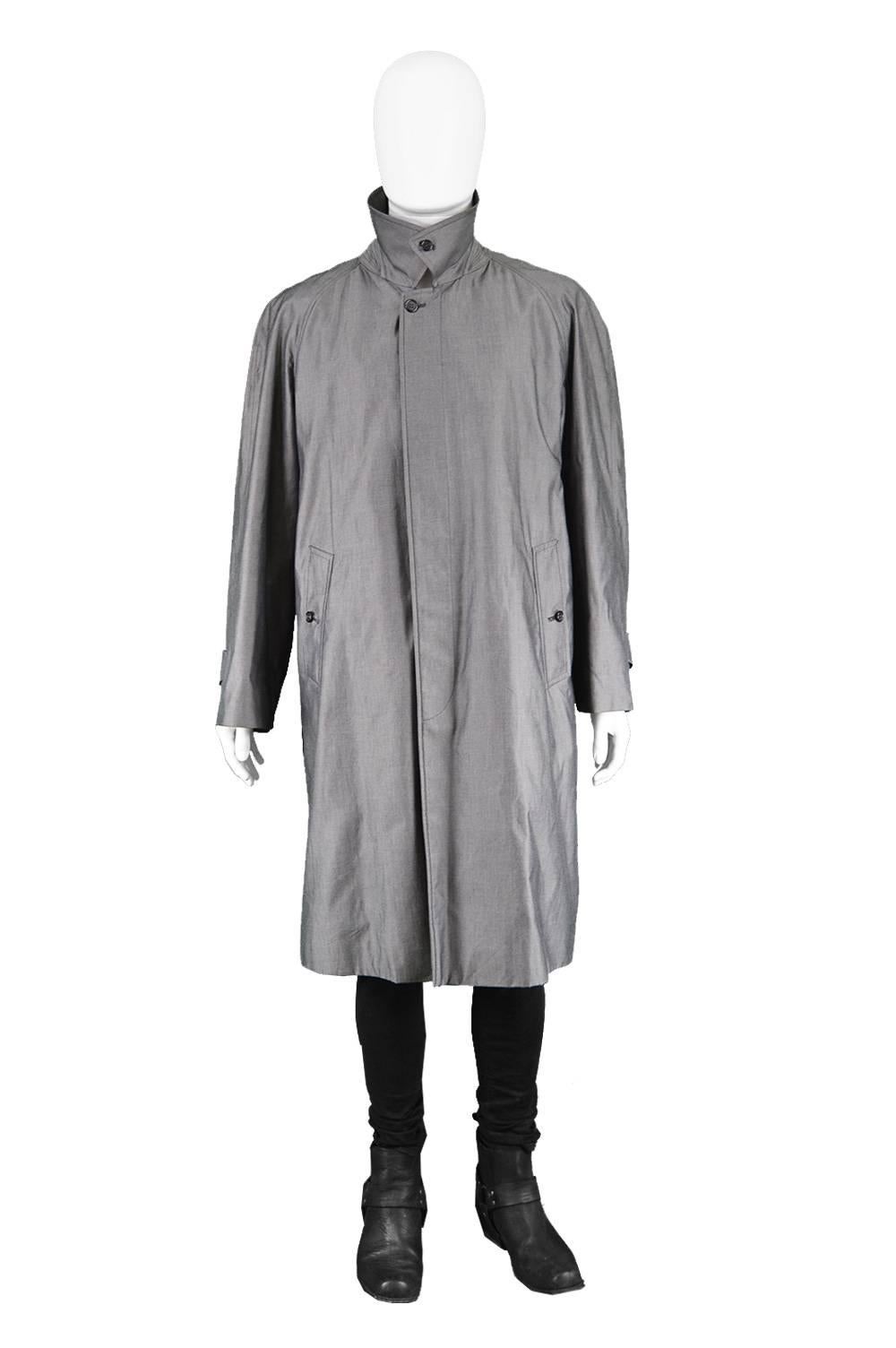 Burberry Men's 100% Cotton Sharkskin Raglan Sleeve Trenchcoat, 1980s


Size: Marked 52 Short which is roughly a men's Large to XL but could fit up to XXL due to the loose fit and really suits more of an average or taller height man. Please check
