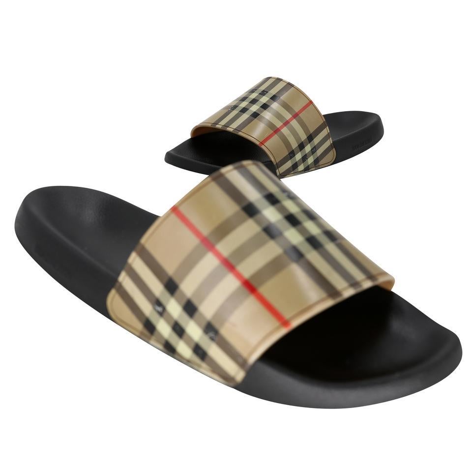 These slides are detailed with the iconic print, referencing a known and loved hallmark of the brand while stepping confidently into the realm of athleisure styling. These are a must-have for any avid fashionista the slides have been used with basic