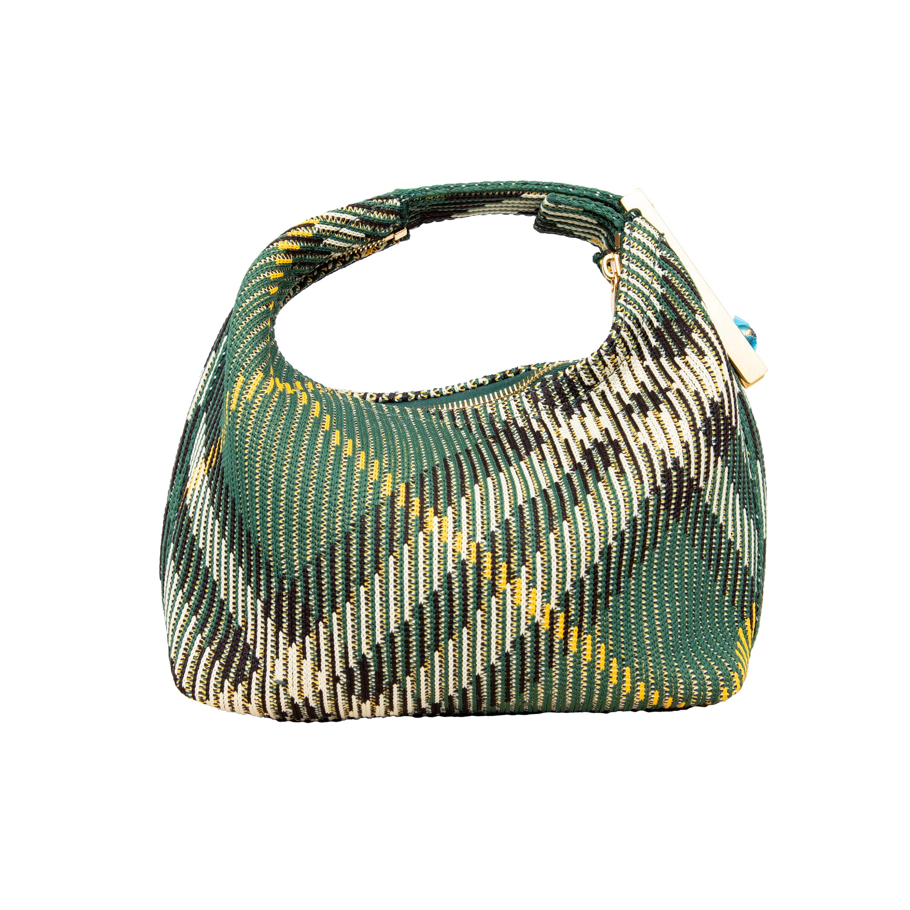 Introducing the Burberry Mini Peg Duffle Bag, crafted with the iconic Burberry Check in green. Throw in your essentials and secure with the logo-engraved peg clip. Features a zip closure, brushed metal hardware, and unlined for a lightweight feel.