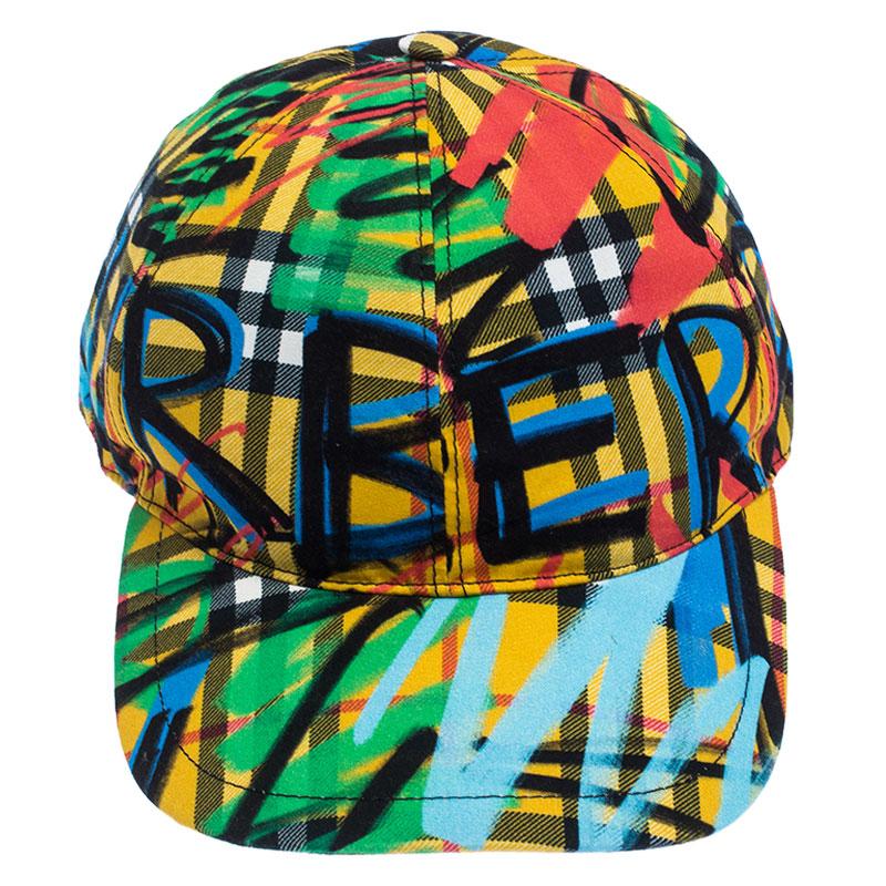 Put the finishing touch to your outfit with this baseball cap by Burberry. This trendy piece is made from signature canvas with graffiti prints and an adjustable strap at the back. The interior is lined with fabric.

Includes: Price Tag, Original