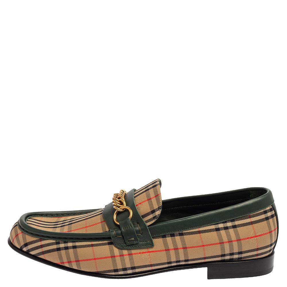 Stylish and super comfortable, these slip-on loafers by Burberry will make a great addition to your shoe collection. They have been designed using the signature Nova Check canvas and leather and styled with round toes and gold-tone chain-link