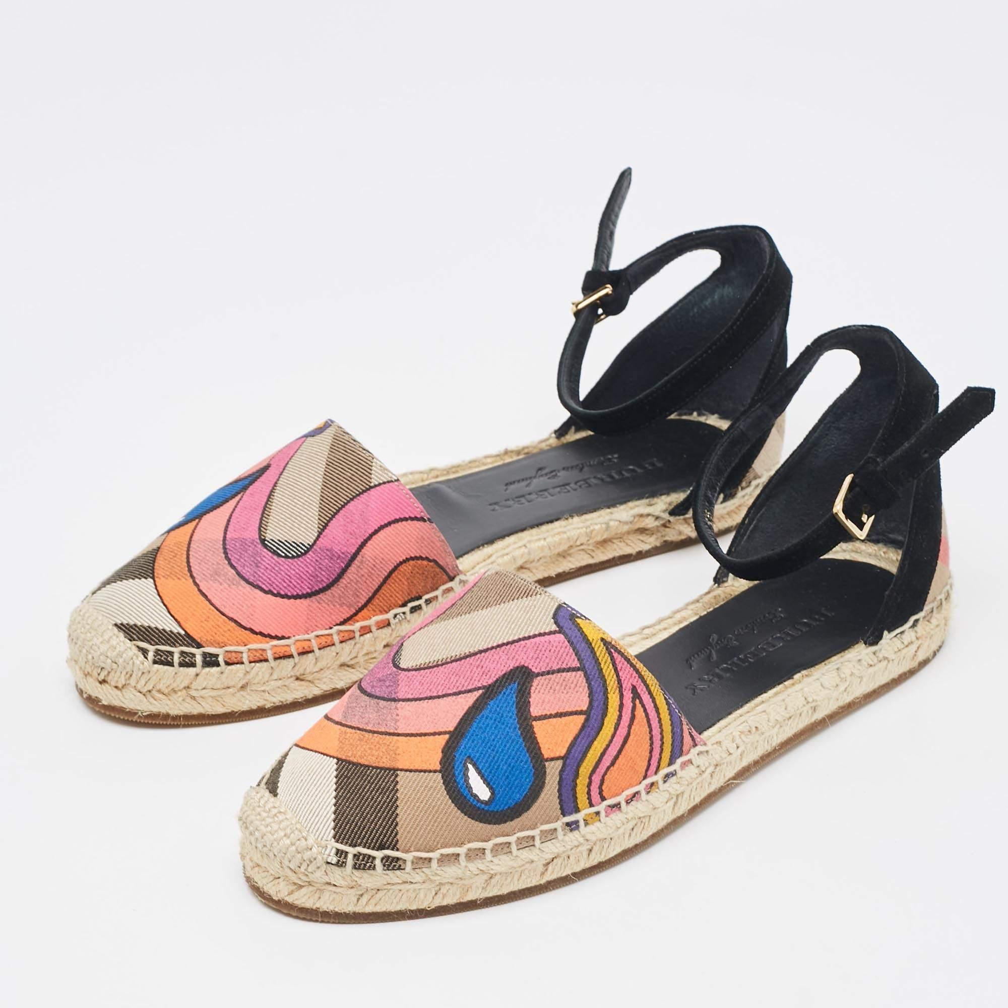 Espadrilles are not just stylish  but also comfortable and easy to wear. This lovely pair from Burberry will accompany a casual outfit with perfection. They are made of colorful canvas and detailed with striking print and labeled rubber soles.
