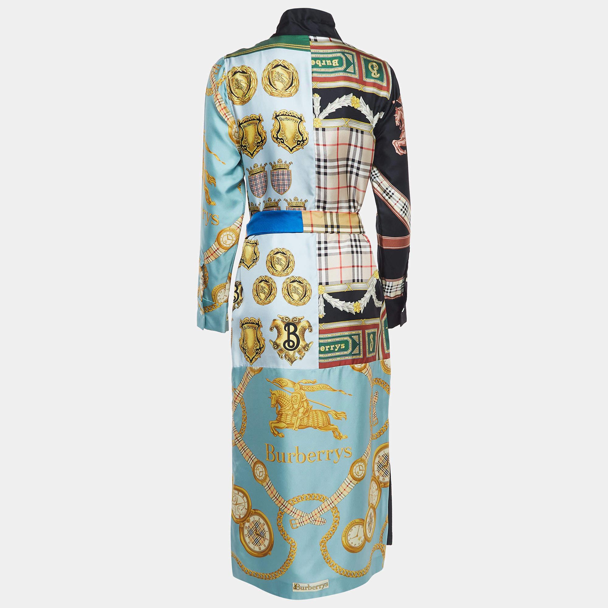 Affichez un look élégant en portant cette robe chemise Burberry. Taillée dans un tissu fin, cette robe présente une silhouette chic pour une coupe cadrée. Coiffez cette création d'accessoires chics et d'escarpins.

Comprend : étiquette de marque
