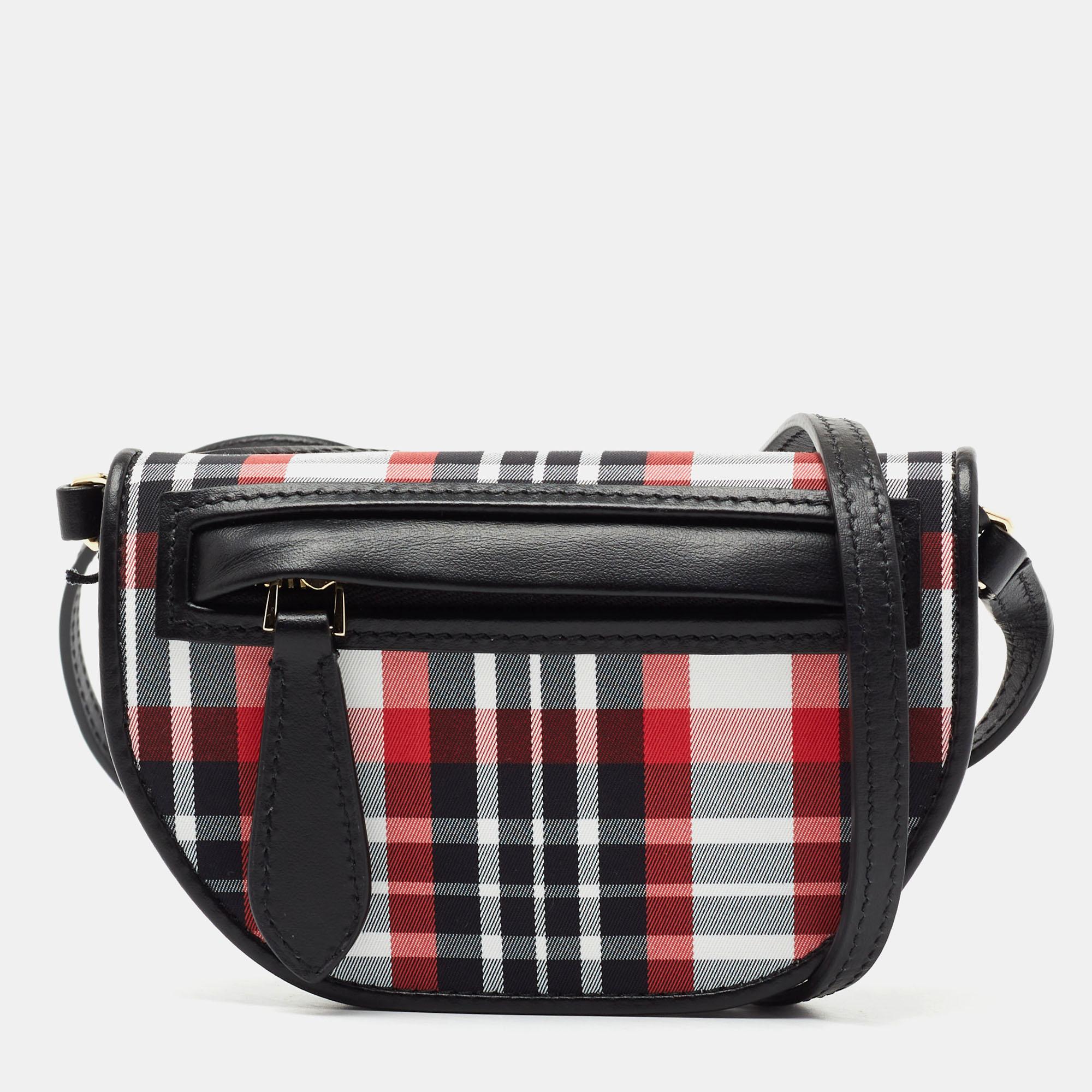 This Burberry crossbody bag is a timeless piece that can last you season after season. The wondrous multicolored bag is made of leather and flaunts a chic Tartan print. It has gold-tone detailing, a flap closure, a long shoulder strap, and a
