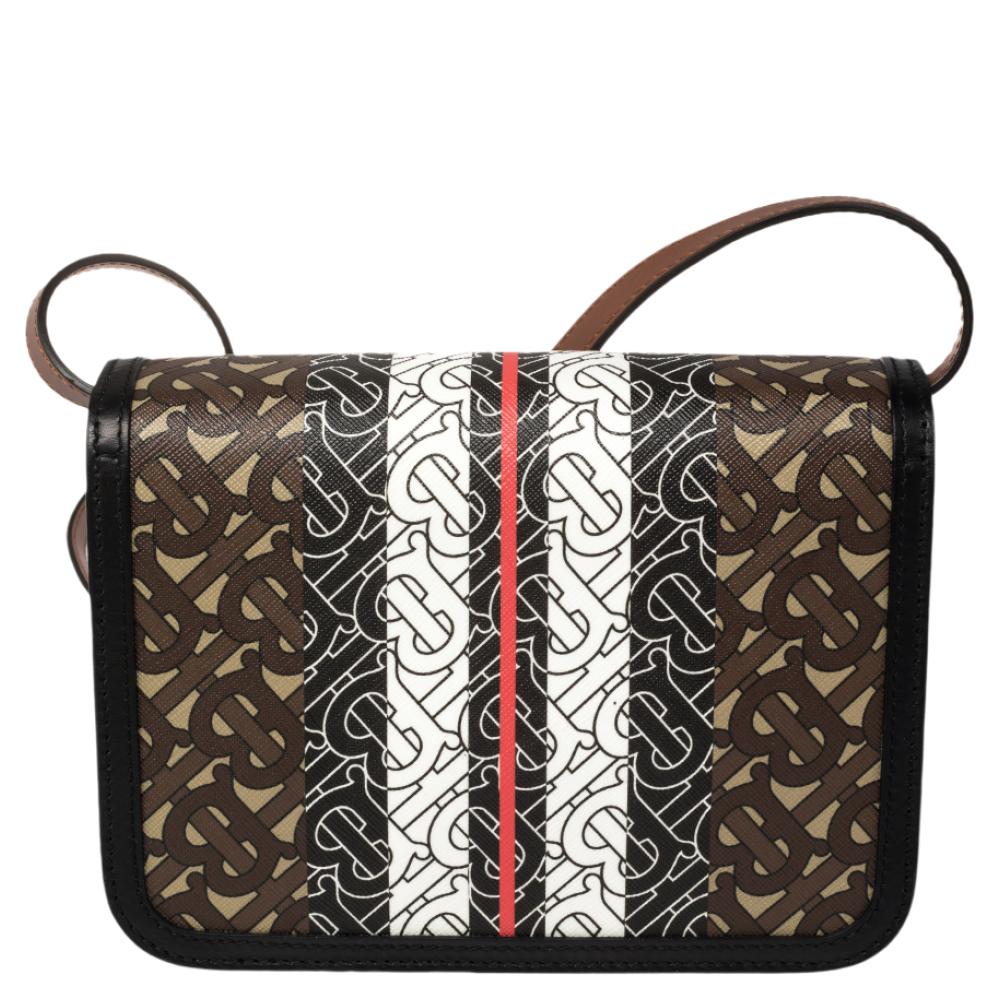 This Burberry bag is an investment piece that's on-trend now! It has been crafted from TB printed coated canvas & leather in multicolored hues. It has a front flap that carries the TB logo and opens to a leather interior. It is finished with a