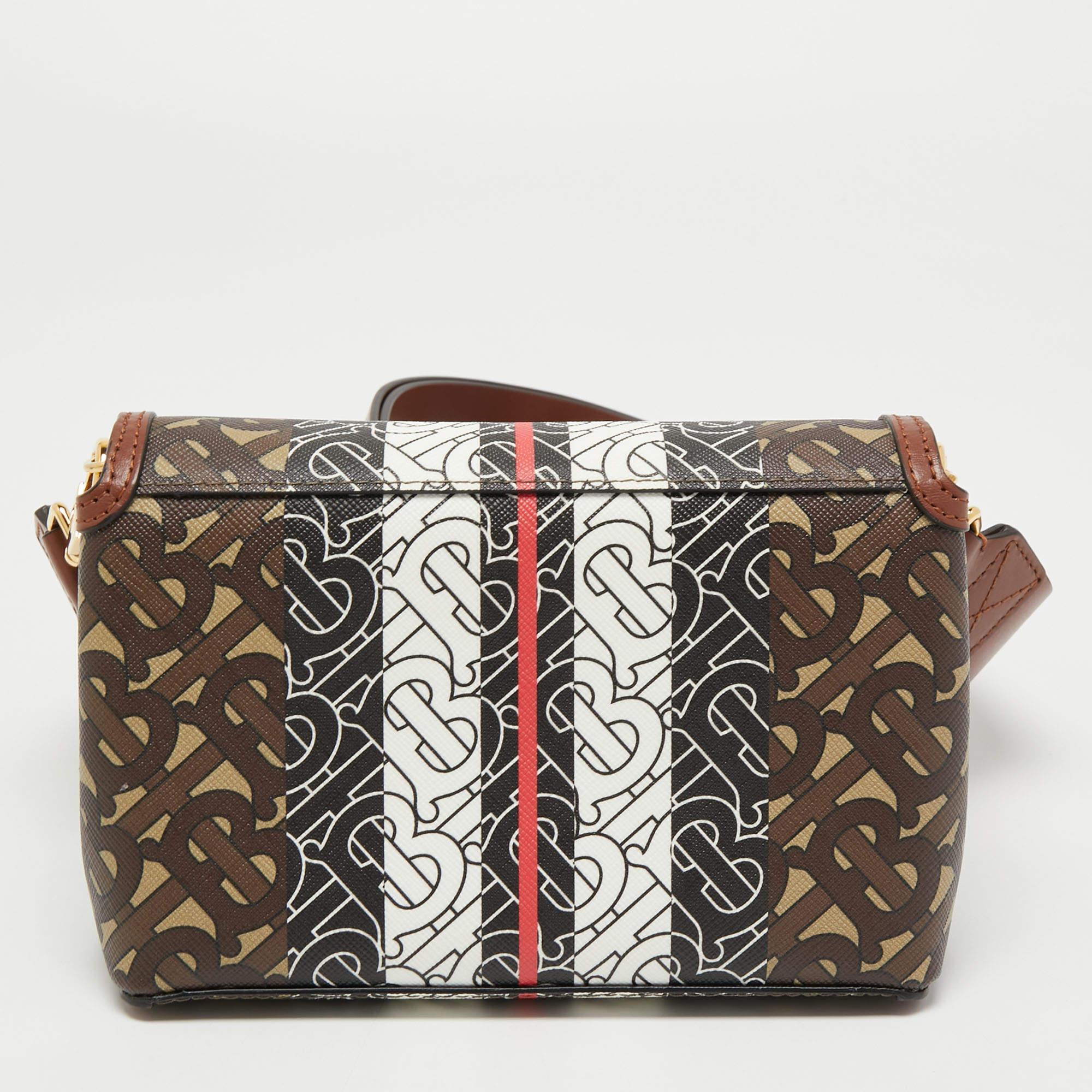 Burberry's TB monogram gives any creation a modern update. This Hackberry bag is a case in point. It is covered in TB-print coated canvas in luxe shades, transforming the classic flap silhouette into a contemporary accessory.

Includes: Original