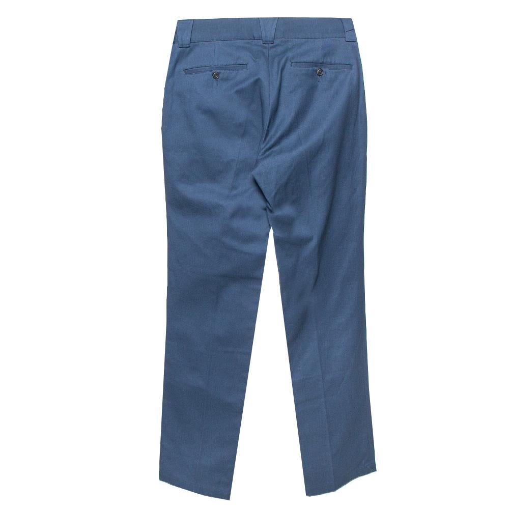 Make a lasting impression in these pants from Burberry. Made of a cotton blend, these navy blue pants offer a straight leg silhouette and come equipped with belt loops, a zip closure, and four pockets. Pair them with formal shirts and smart