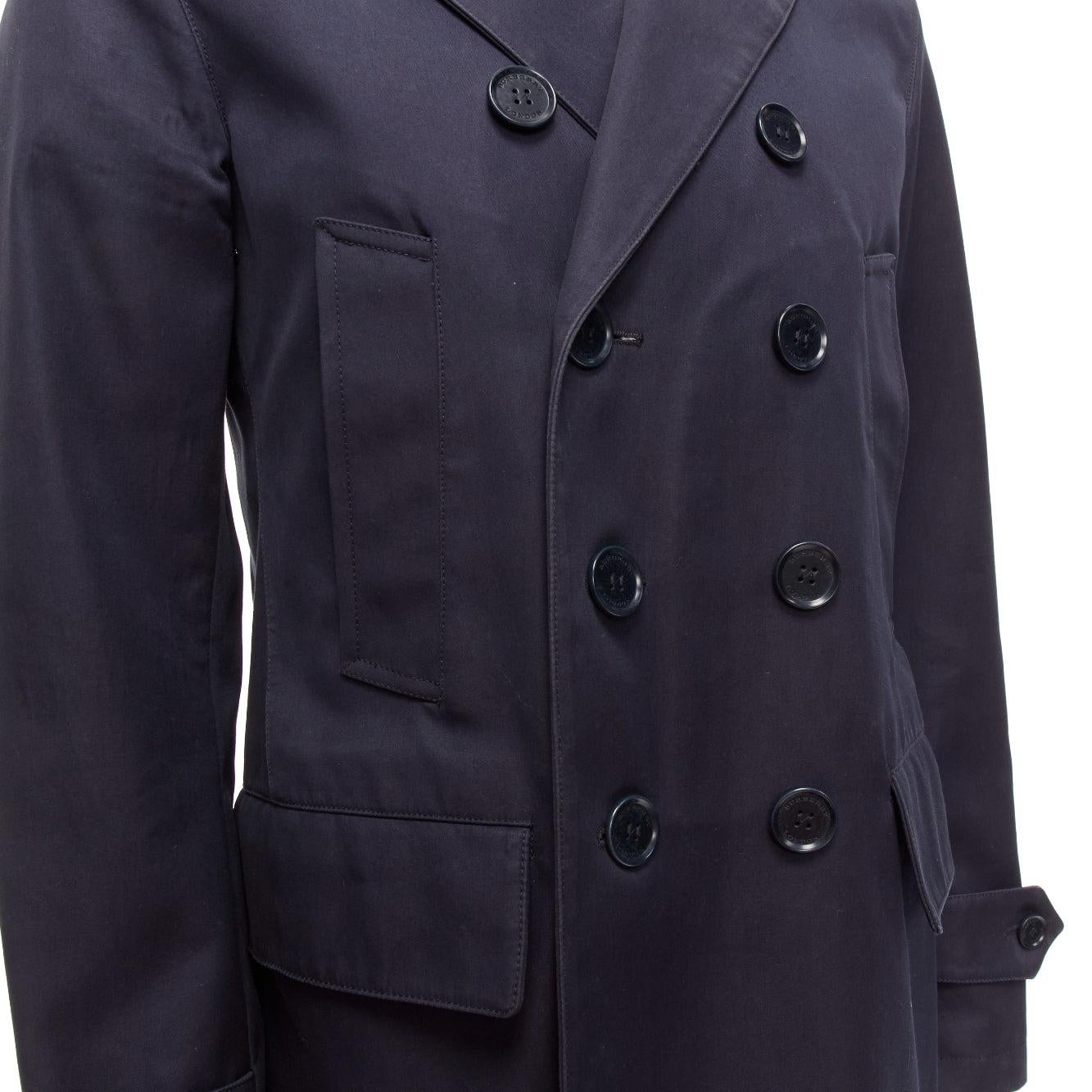 BURBERRY navy cotton wool lined leather epaulet short trench coat IT48 M
Reference: MLCO/A00003
Brand: Burberry
Designer: Christopher Bailey
Material: Cotton
Color: Navy, Black
Pattern: Solid
Closure: Button
Lining: Multicolour Fabric
Extra Details: