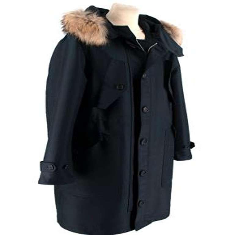 Burberry Navy Parka with Fox Fur Trimmed Hood

-Detachable fur trim at hood
- Multiple inset pockets
-Wind guards at the cuffs
-Straight hem
-Zip fastening
-Water-repellent
-Heavyweight, non-stretch

Materials: 
Fox fur
100% Polyester 
Interior
80%
