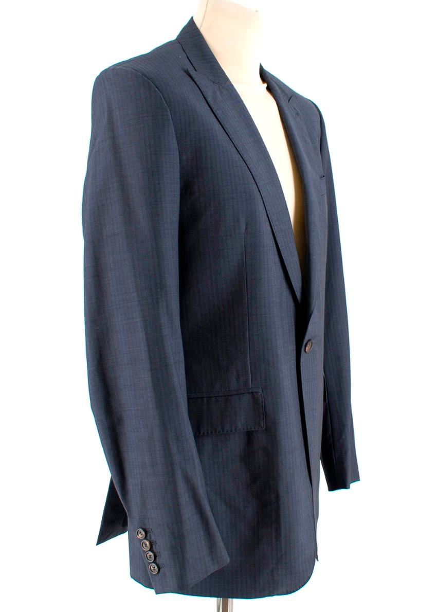 Burberry Navy Subtle Striped Two Piece Wool Suit

Purchased at the Elton John Aids Foundation Auction - Owned by Elton John & David Furnish

Jacket
- Single button closure
- Grey stripes
- Two front flap pockets
- One breast pocket
- Two internal