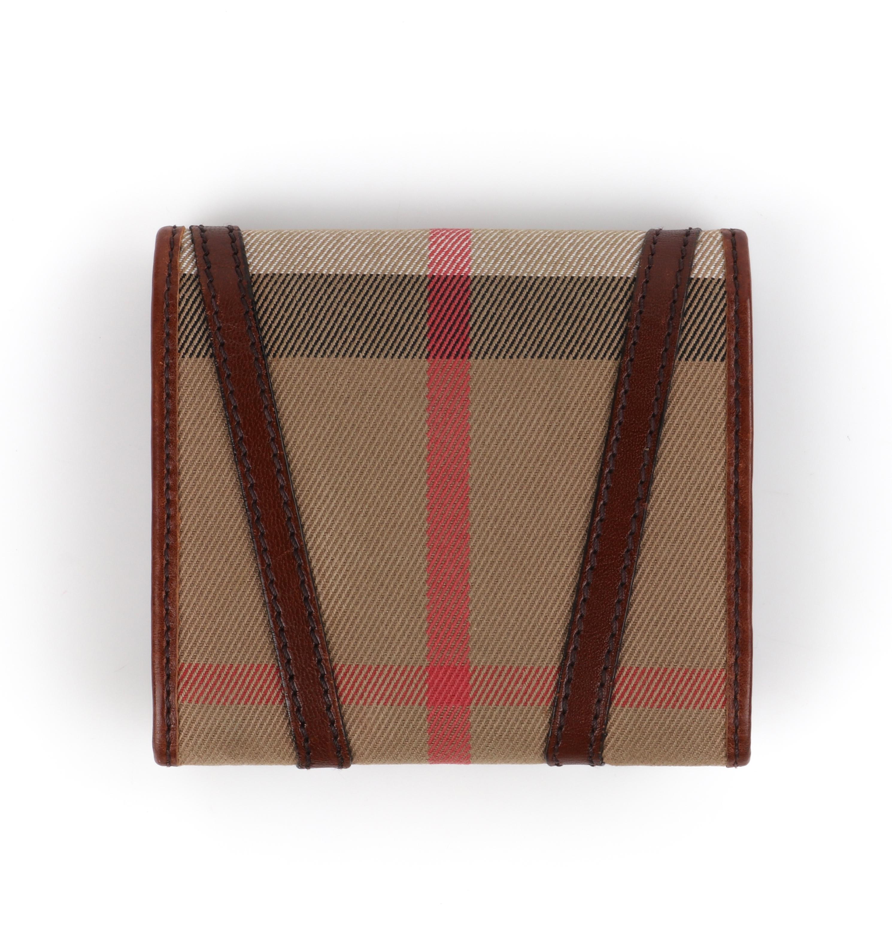 BURBERRY Nova Check Tartan Leather Trifold Square Compact Wallet
  
Brand / Manufacturer: Burberry
Designer: Christopher Bailey
Style: Trifold wallet 
Color(s): Shades of brown, red, black, white (exterior, interior); gold (hardware)
Lined: