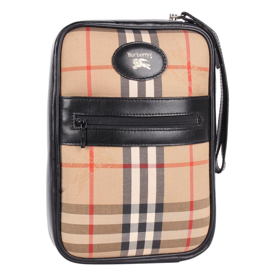 Authentic, pre-owned multicolor Nova Check Burberry wristlet. Features: Signature fabric, leather trim, black top zip closure, and front zipper pocket.

Strap: 6.5