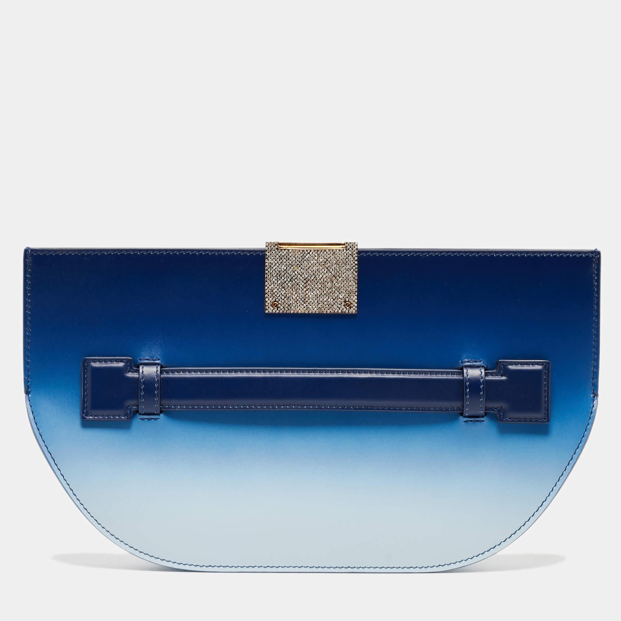 This clutch is just the right accessory to compliment your chic ensemble. It comes crafted in quality material featuring a well-sized interior that can comfortably hold all your little essentials.

Includes: Original Dustbag, Info Booklet