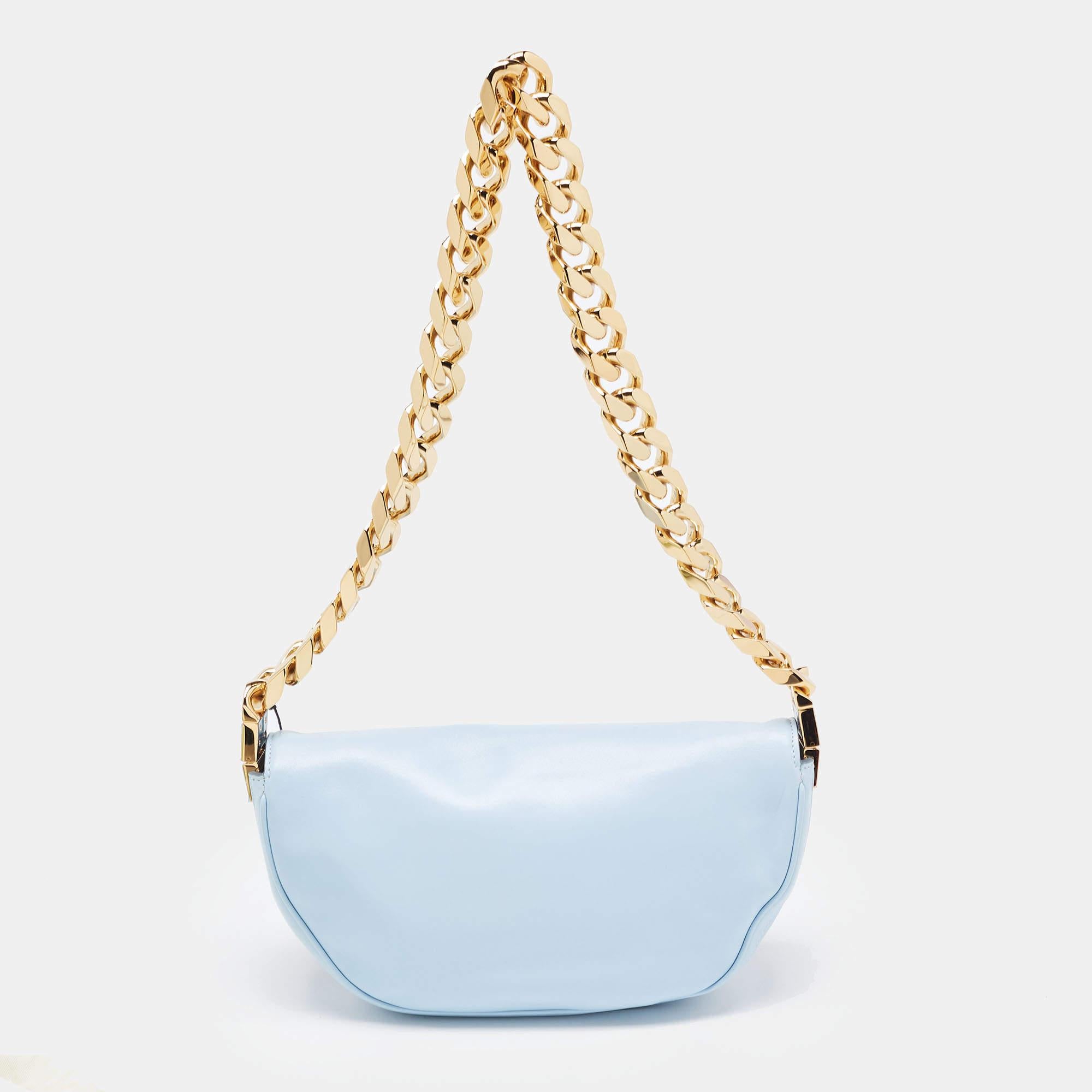 Indulge in luxury with this Burberry pale blue bag. Meticulously crafted from premium materials, it combines exquisite design, impeccable craftsmanship, and timeless elegance. Elevate your style with this fashion accessory.

Includes: Original